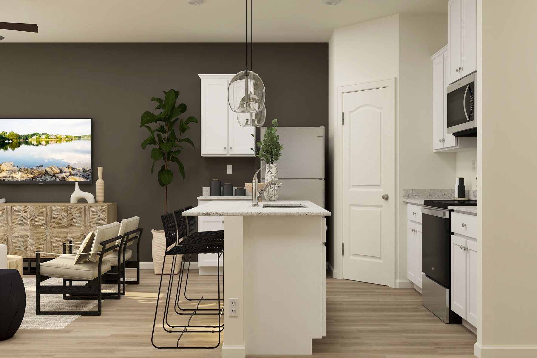 The kitchen of the Hilgard has white wood cabinetry.