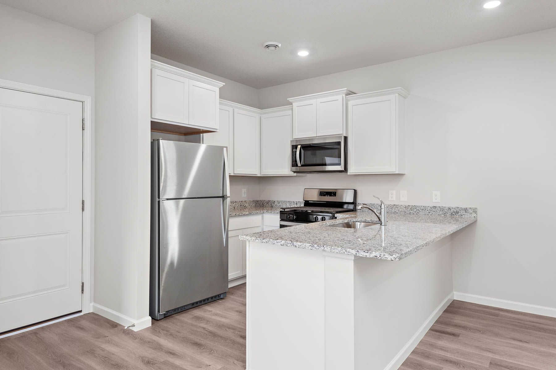 The kitchen appliances come included in this home.
