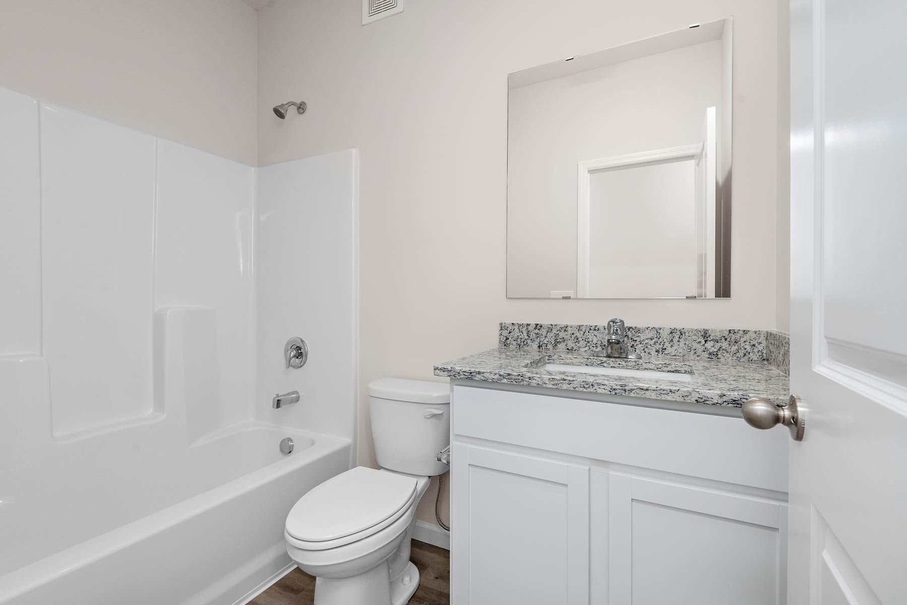 The secondary bathroom has the tub/shower combo.