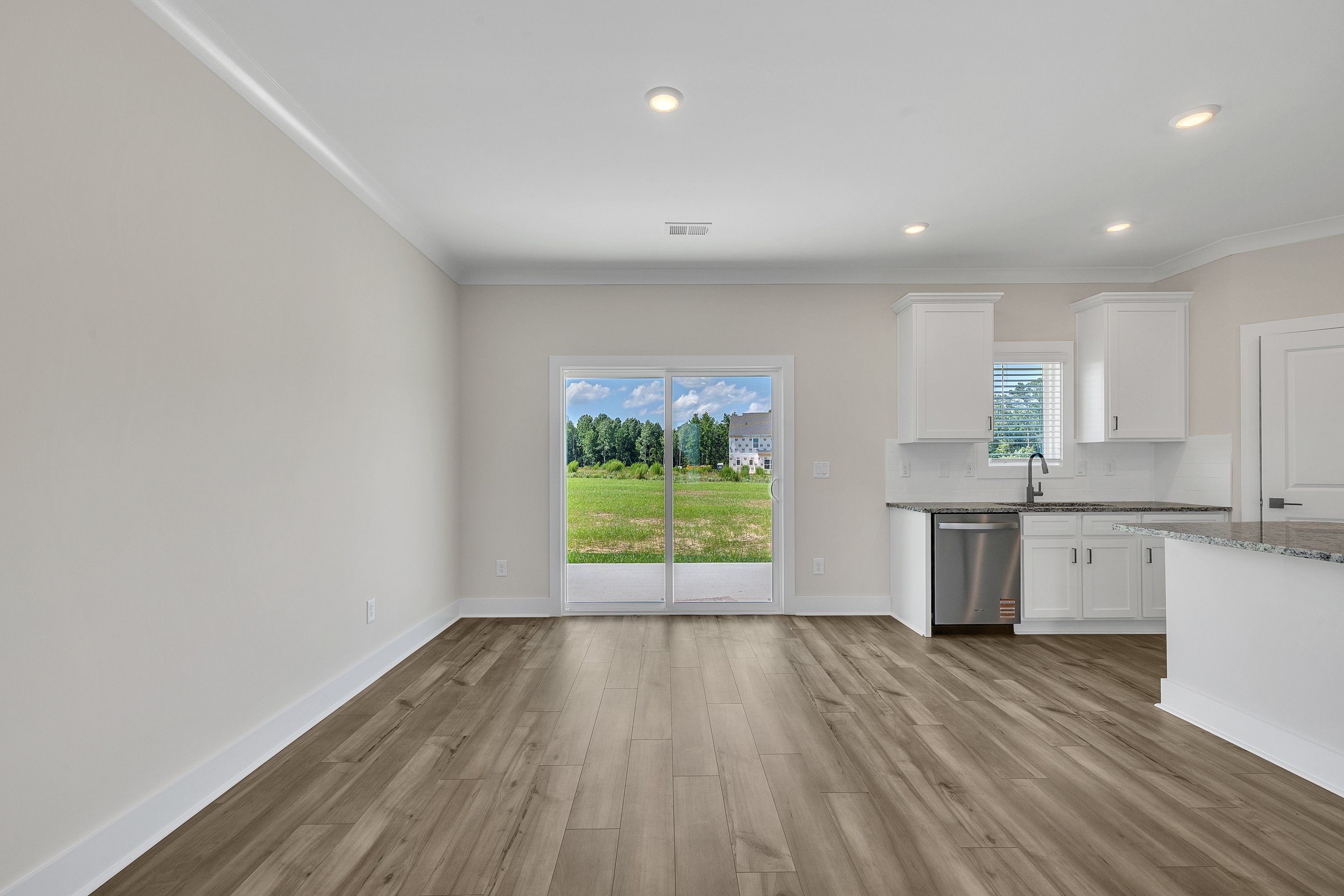 Sliding doors open to the backyard. 