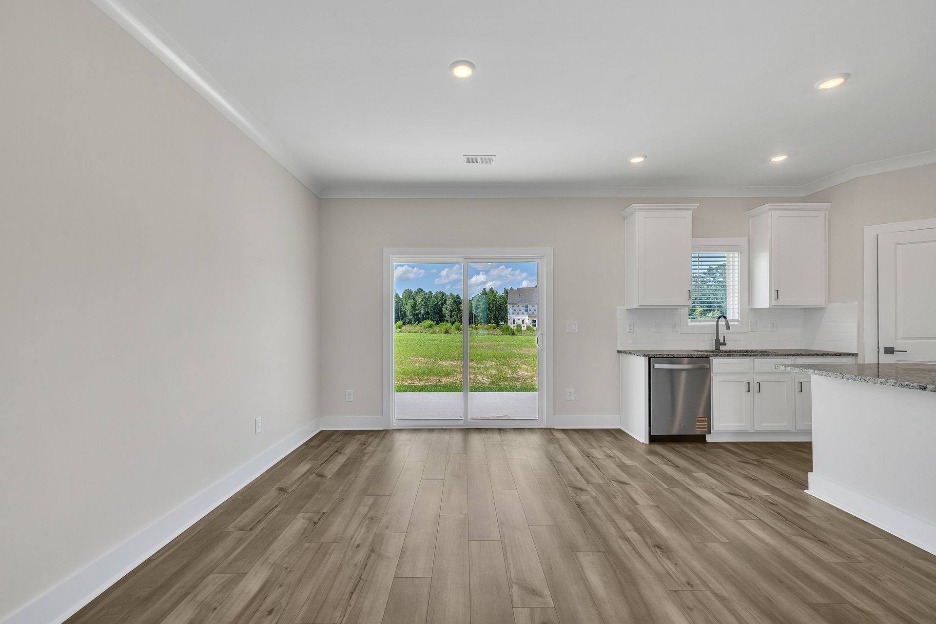 Sliding doors open to the backyard. 
