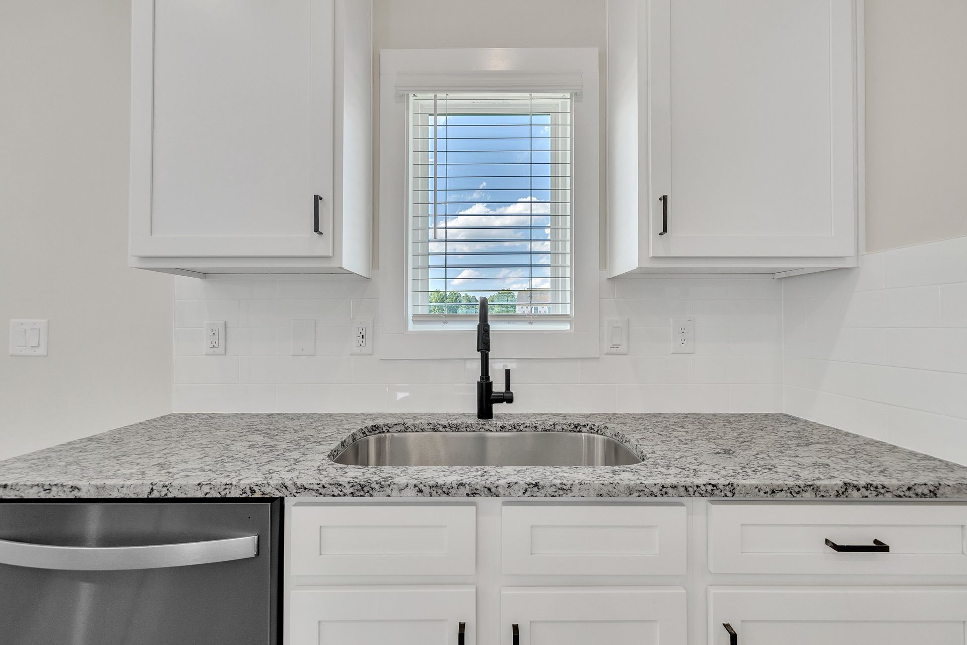 Window over the sink in the kitchen.