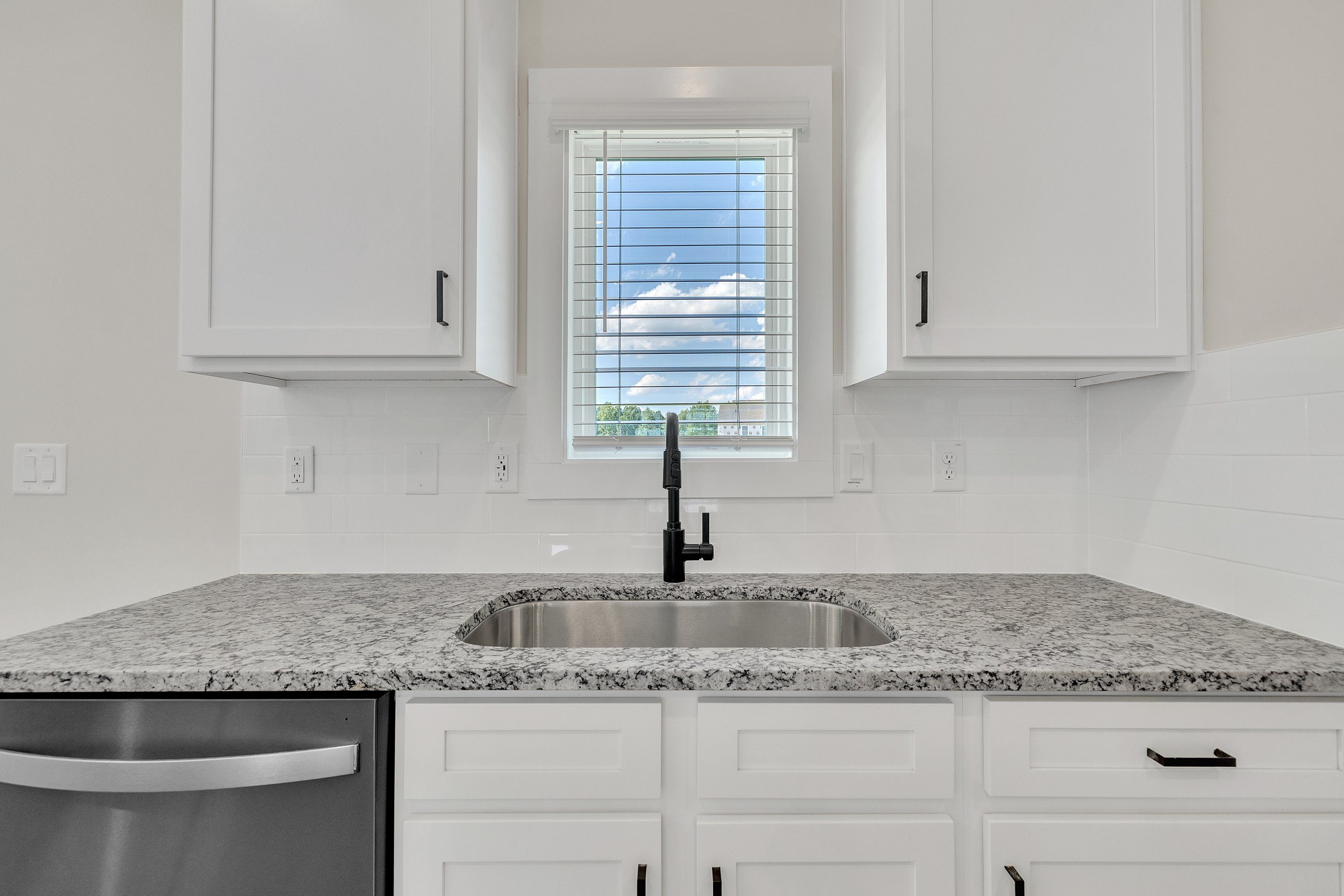 Window over the sink in the kitchen.