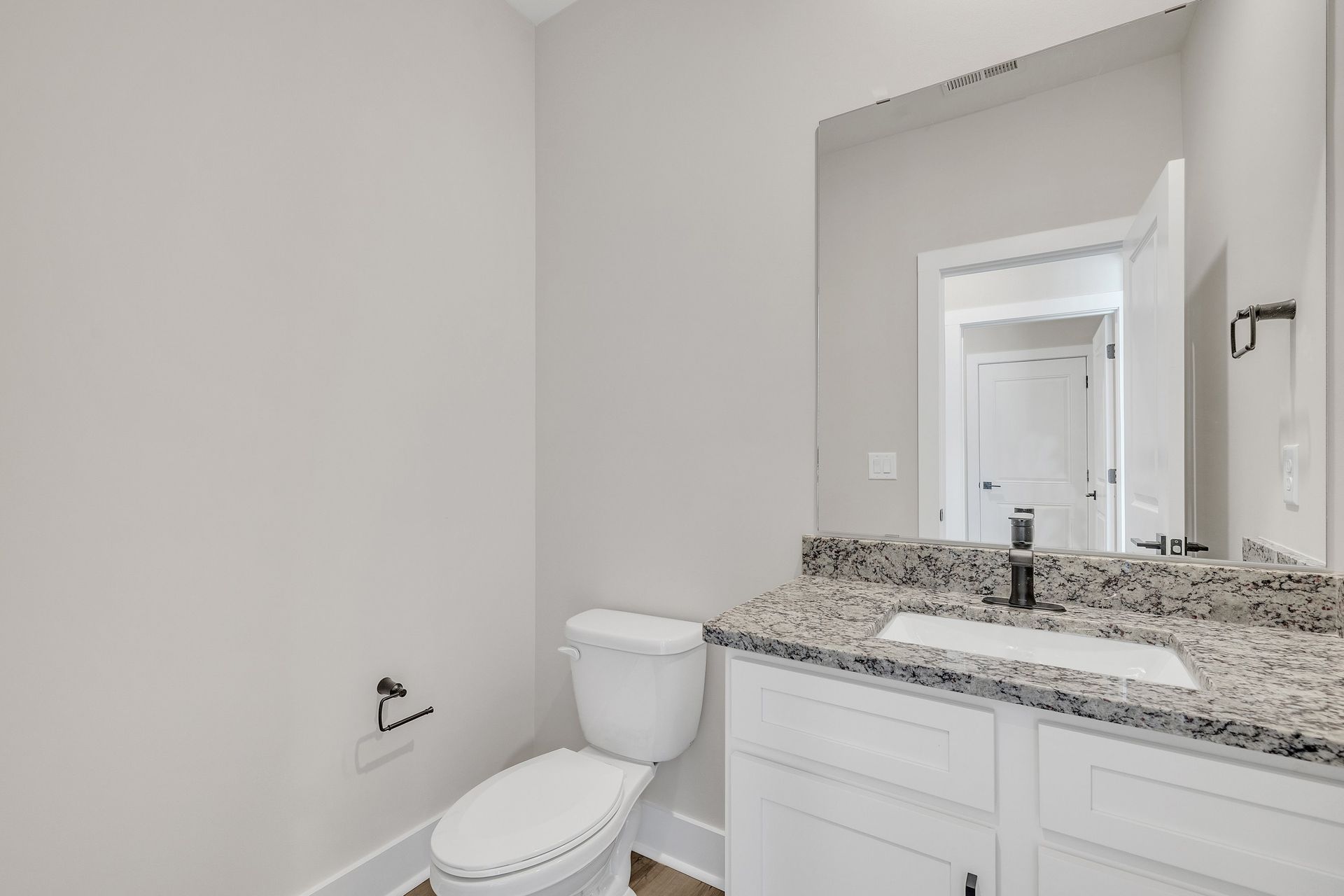 The bathrooms have granite countertops