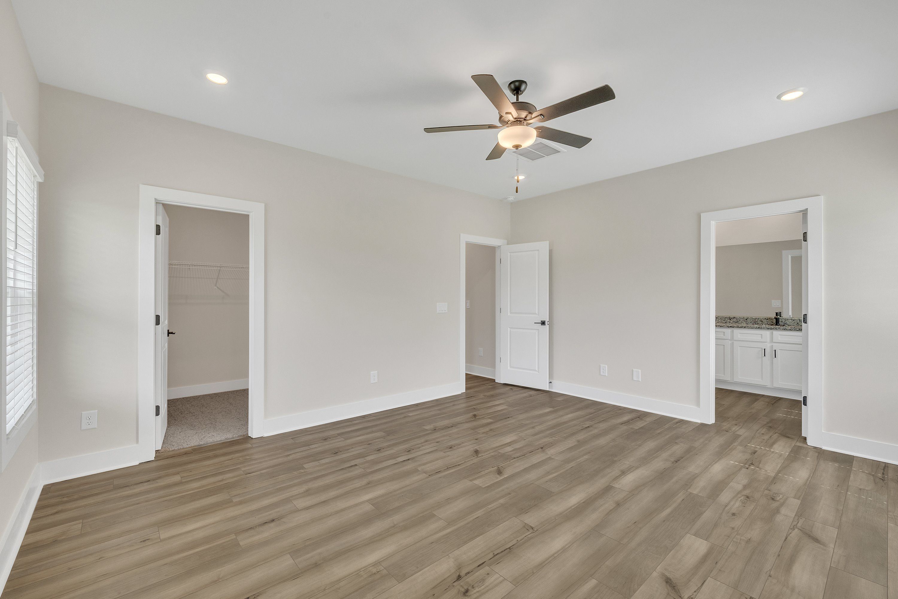 This bedroom has ample space for your king-sized furniture. 