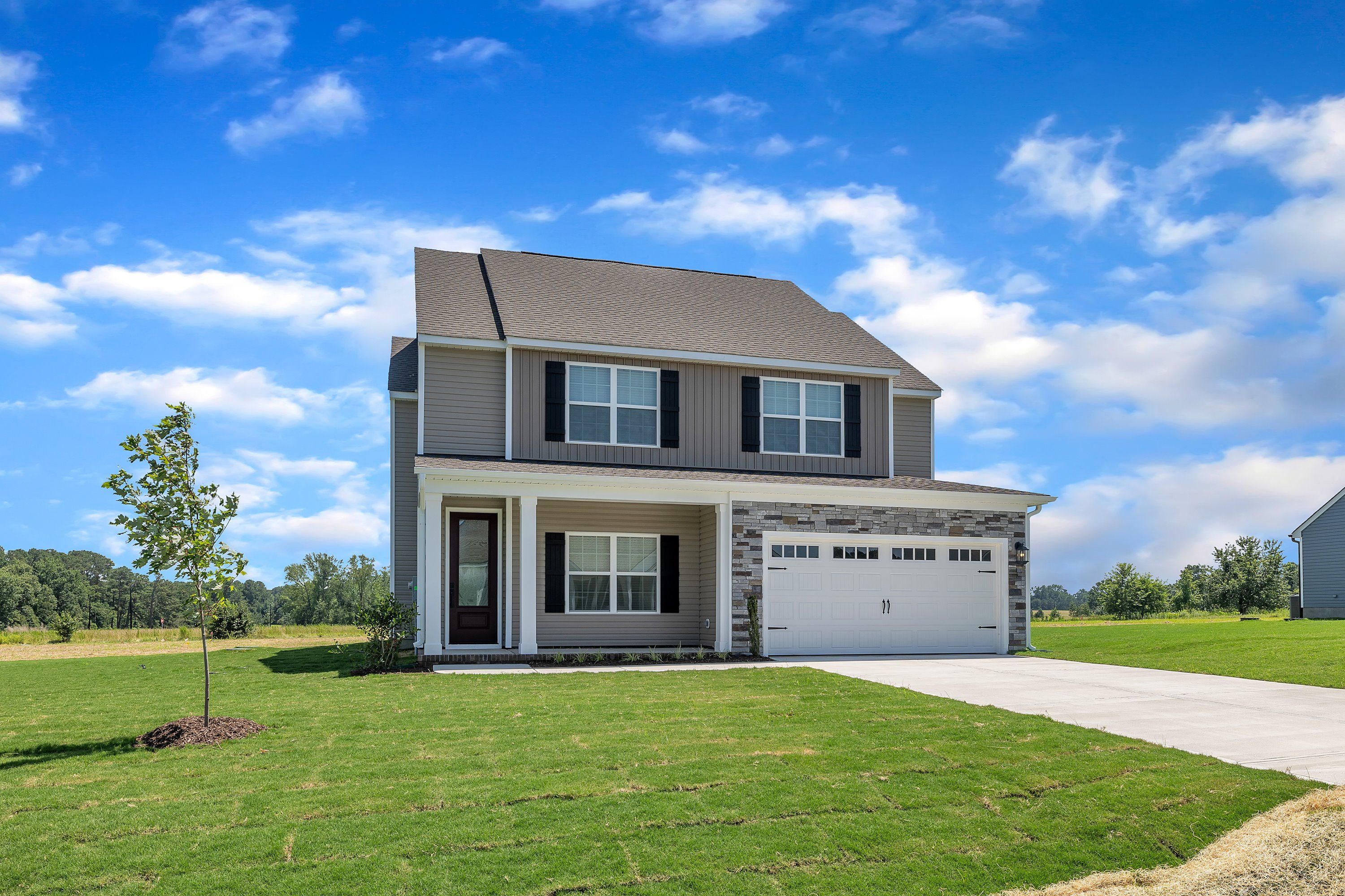 Angled-view of the Craven with a 2-car garage. 