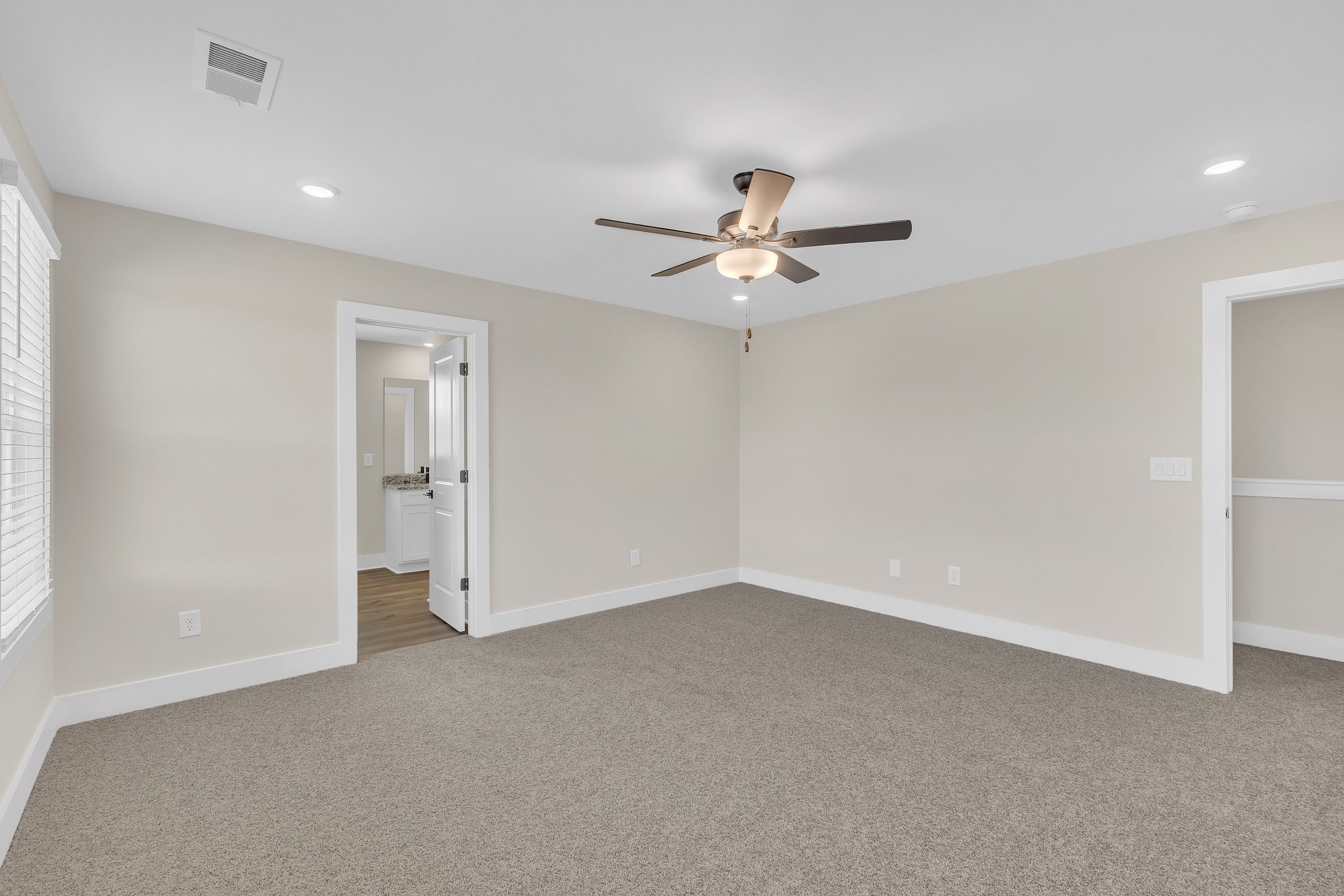 The secondary bedroom has lots of space. 