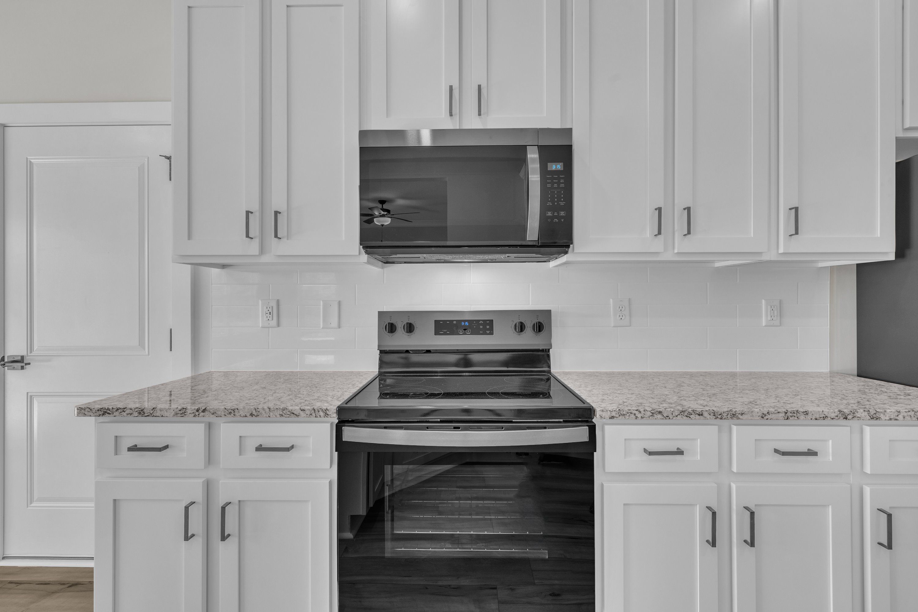 The kitchen has granite countertops.