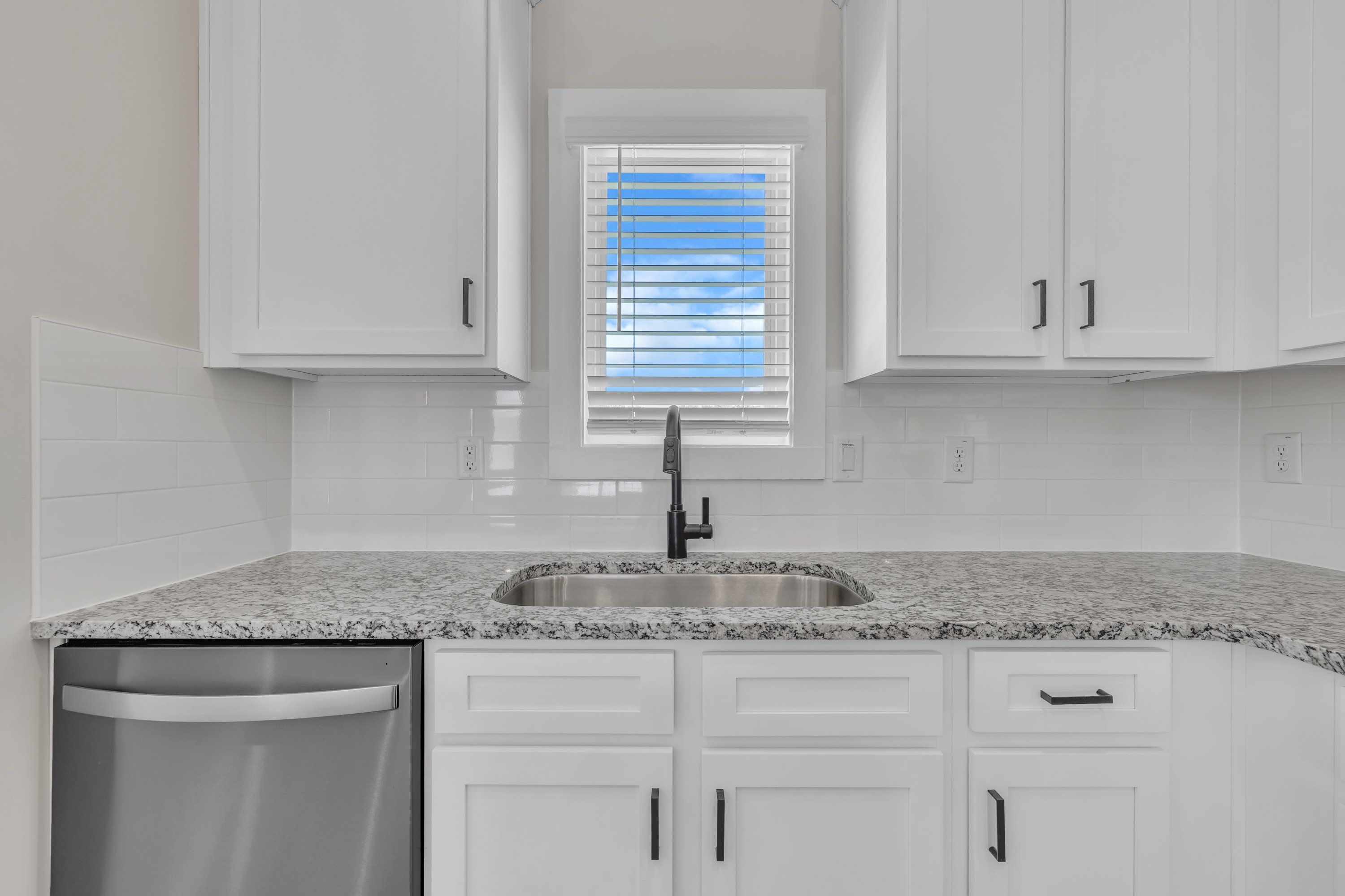 The kitchen has granite countertops.
