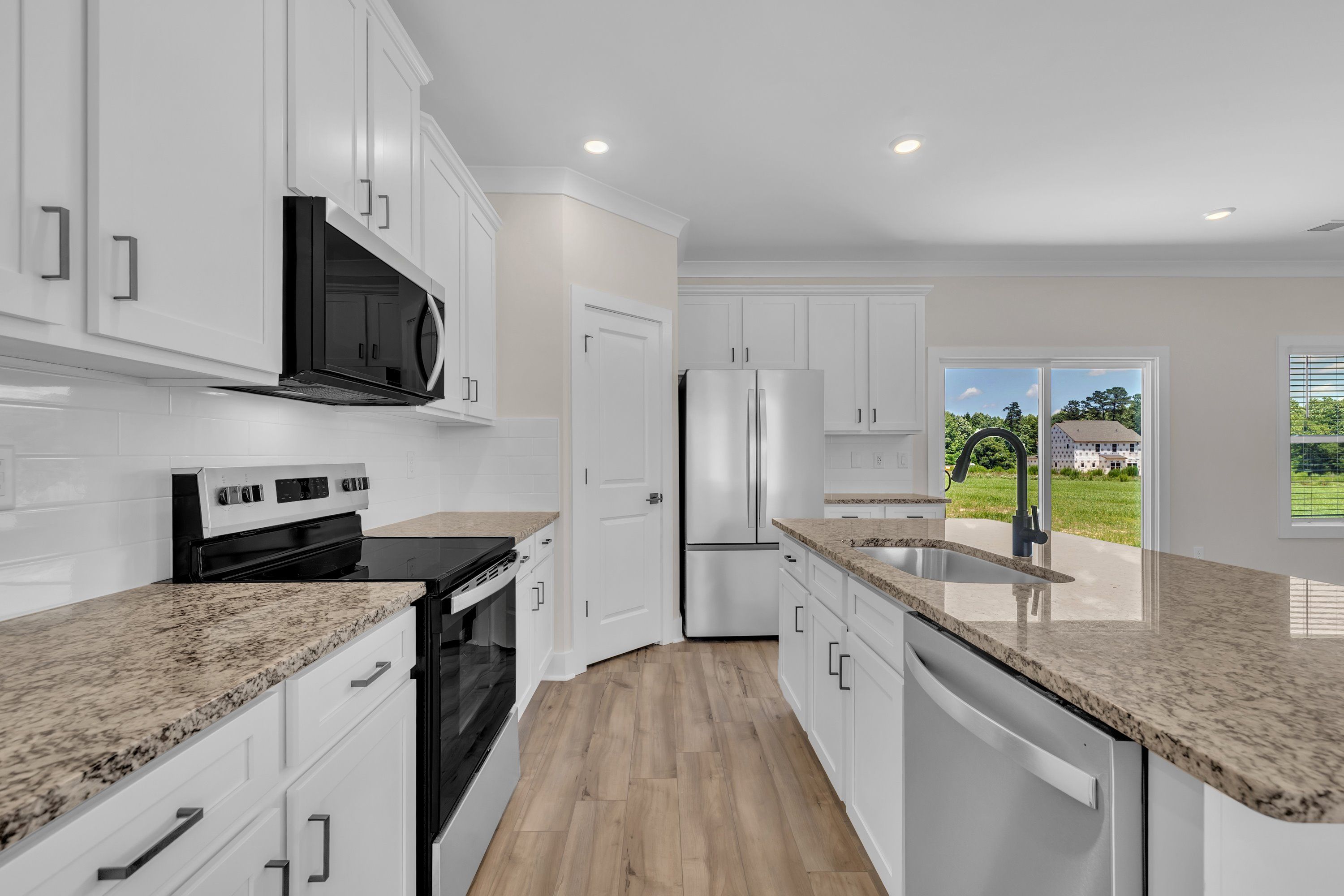The kitchen comes chef-ready. 