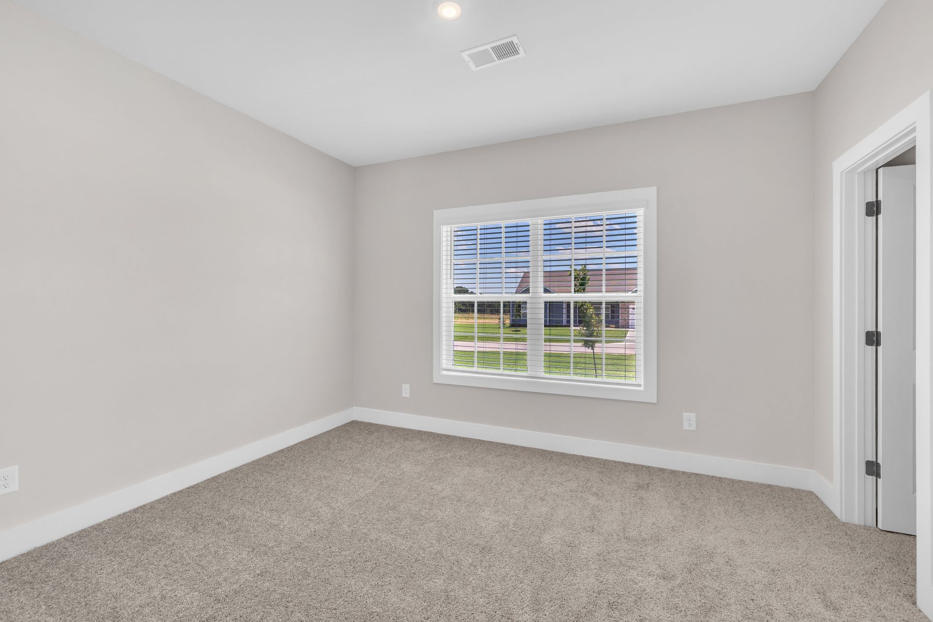 The secondary bedroom has lots of space. 