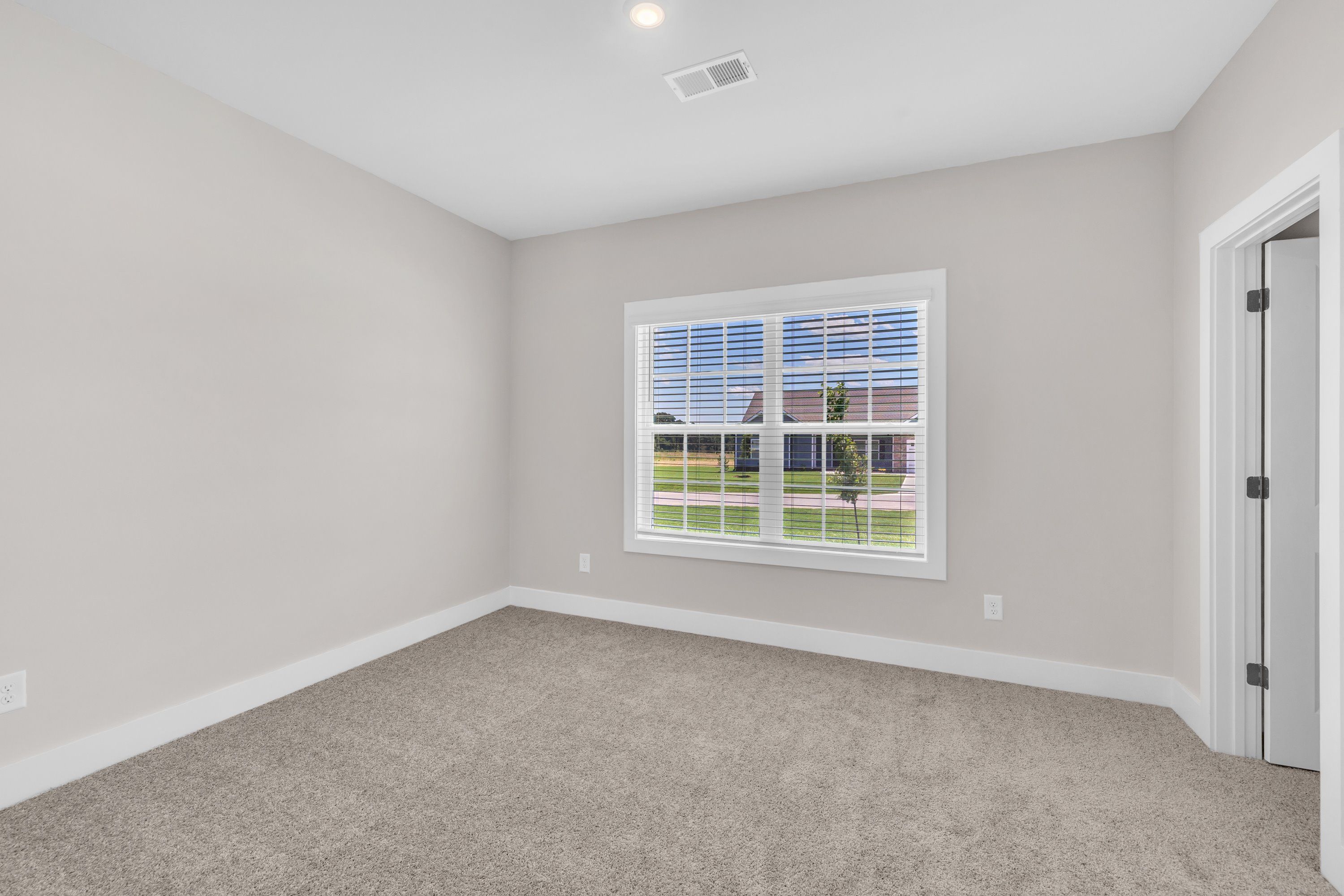 The secondary bedroom has lots of space. 