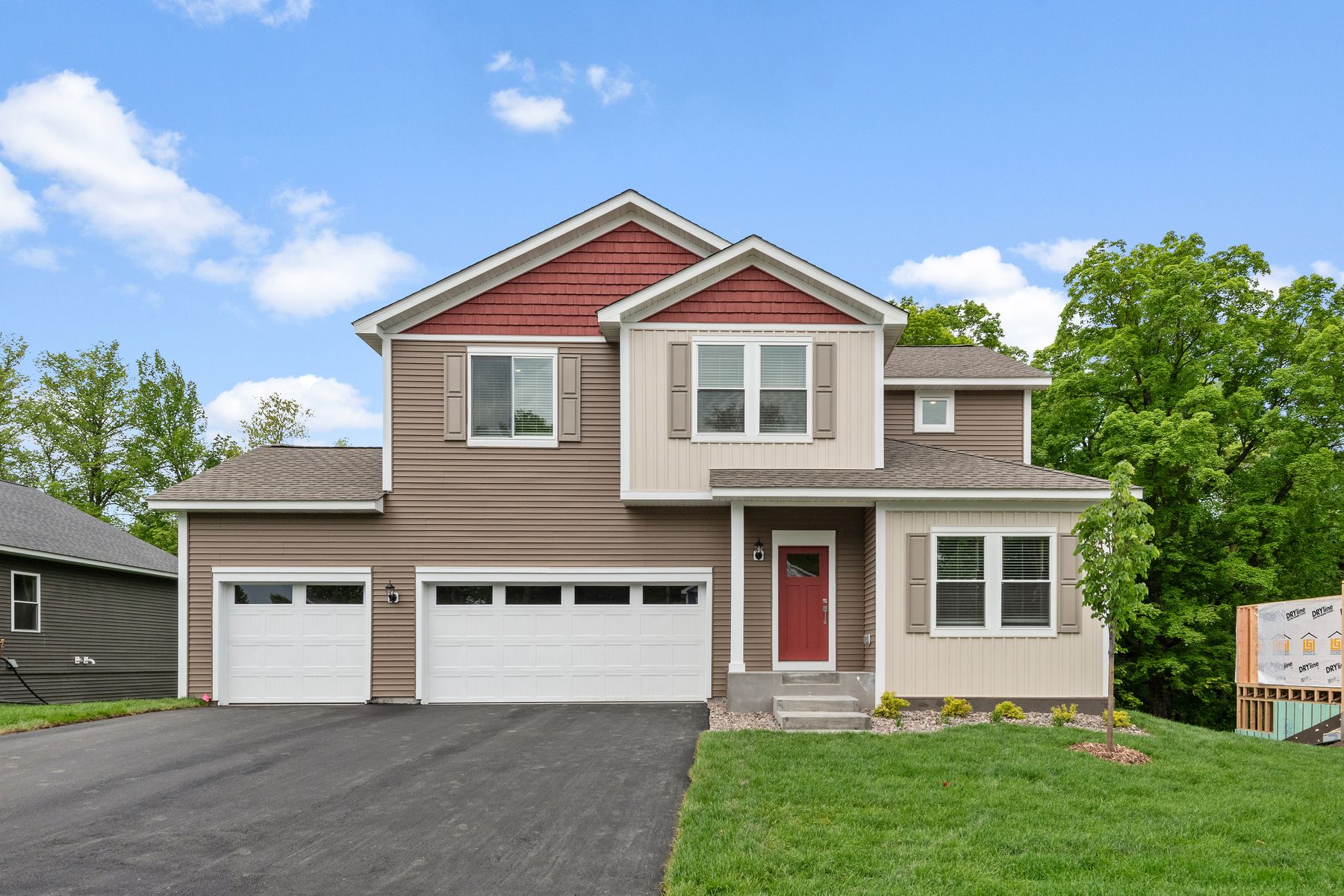 The Perkins is a beautiful two story home with siding.
