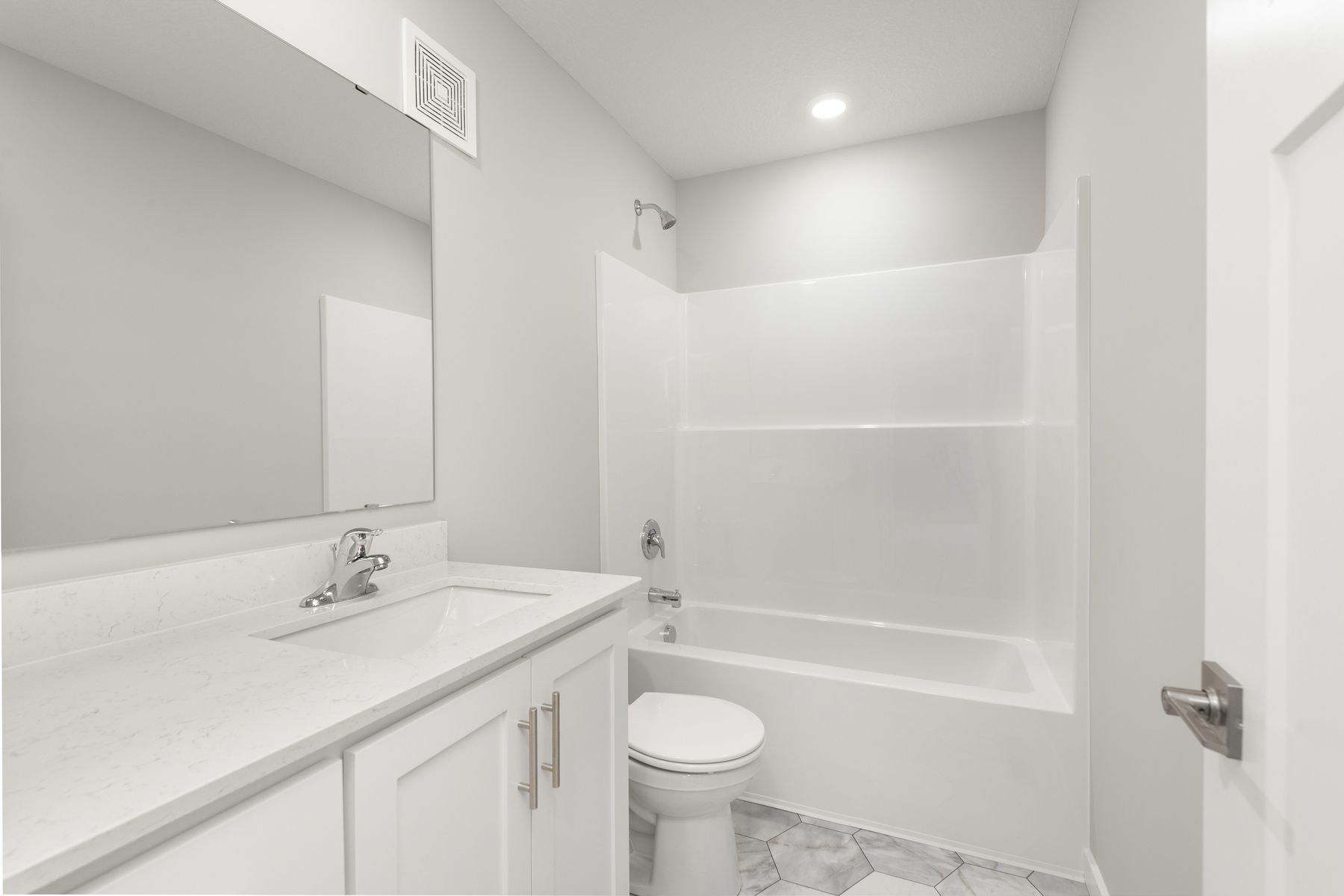 The secondary bathroom has the tub/shower combo.