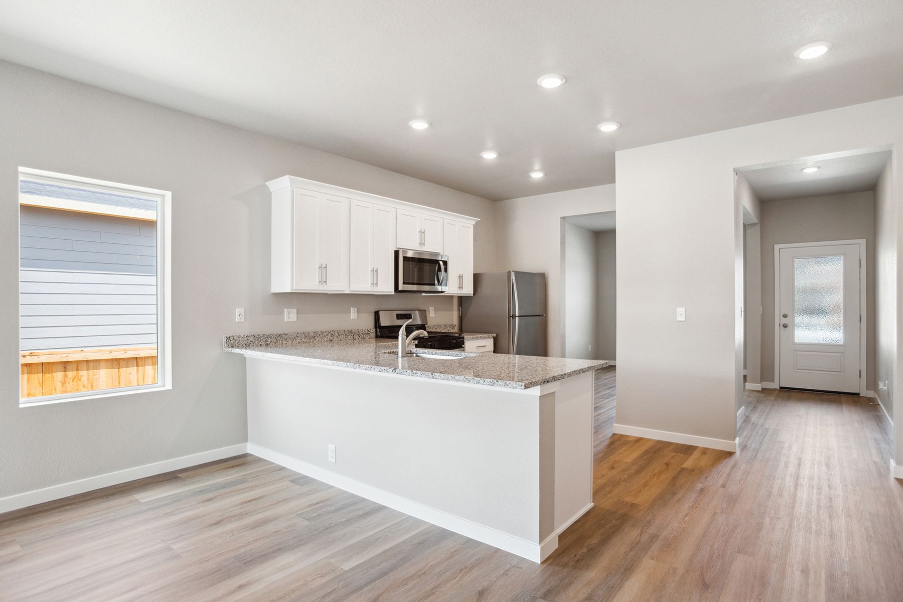 The kitchen appliances come included in this home.