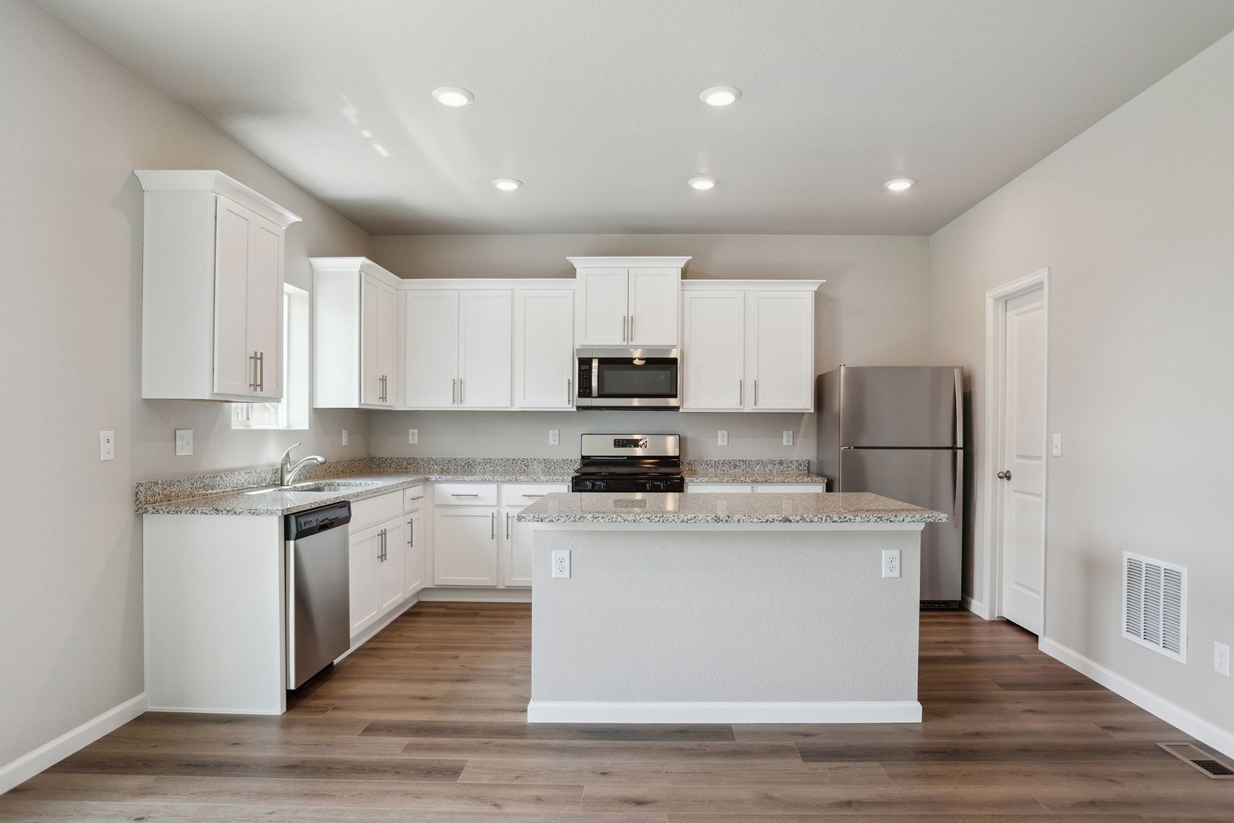 The kitchen appliances come included in this home.