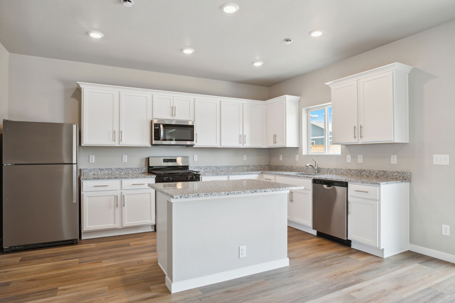 The kitchen appliances come included in this home.