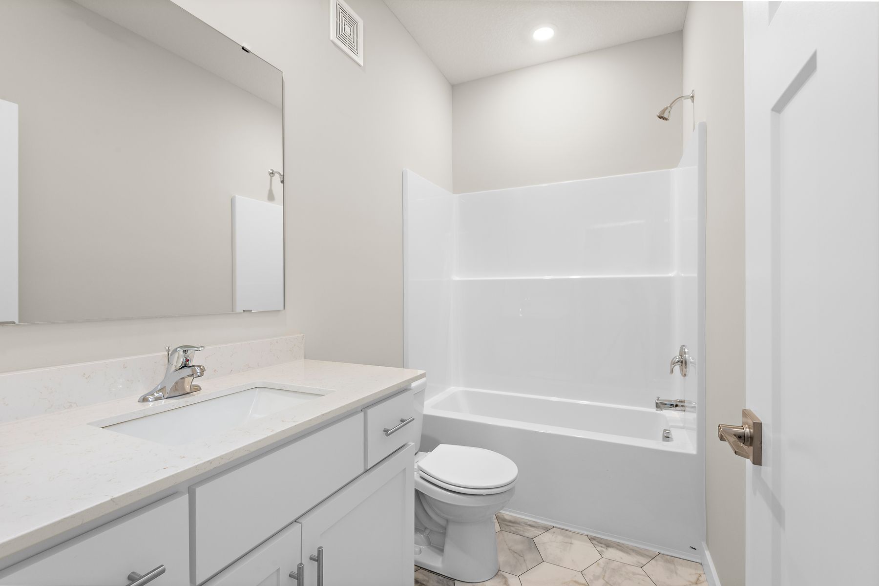 The secondary bathroom has the tub/shower combo.