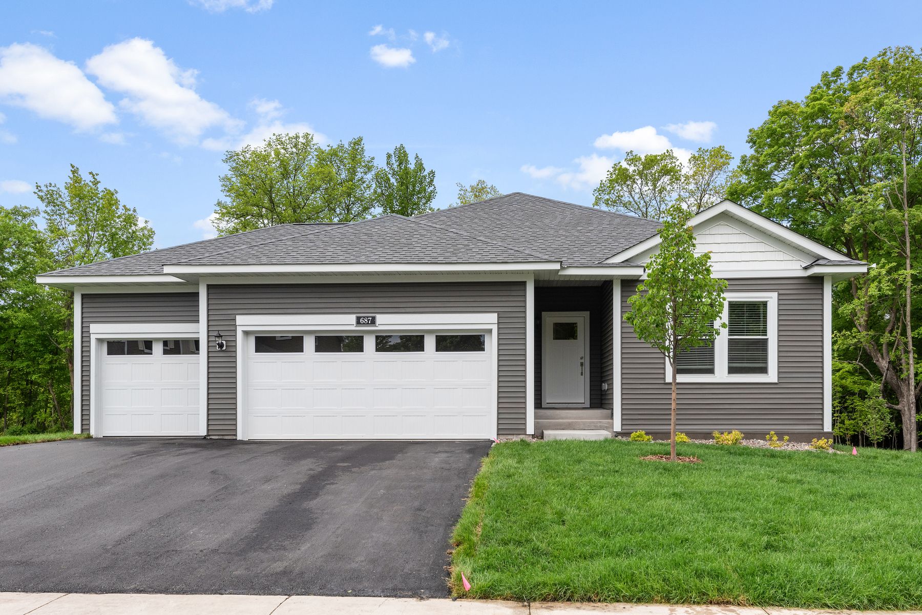 The Harris is a beautiful single story home with siding.