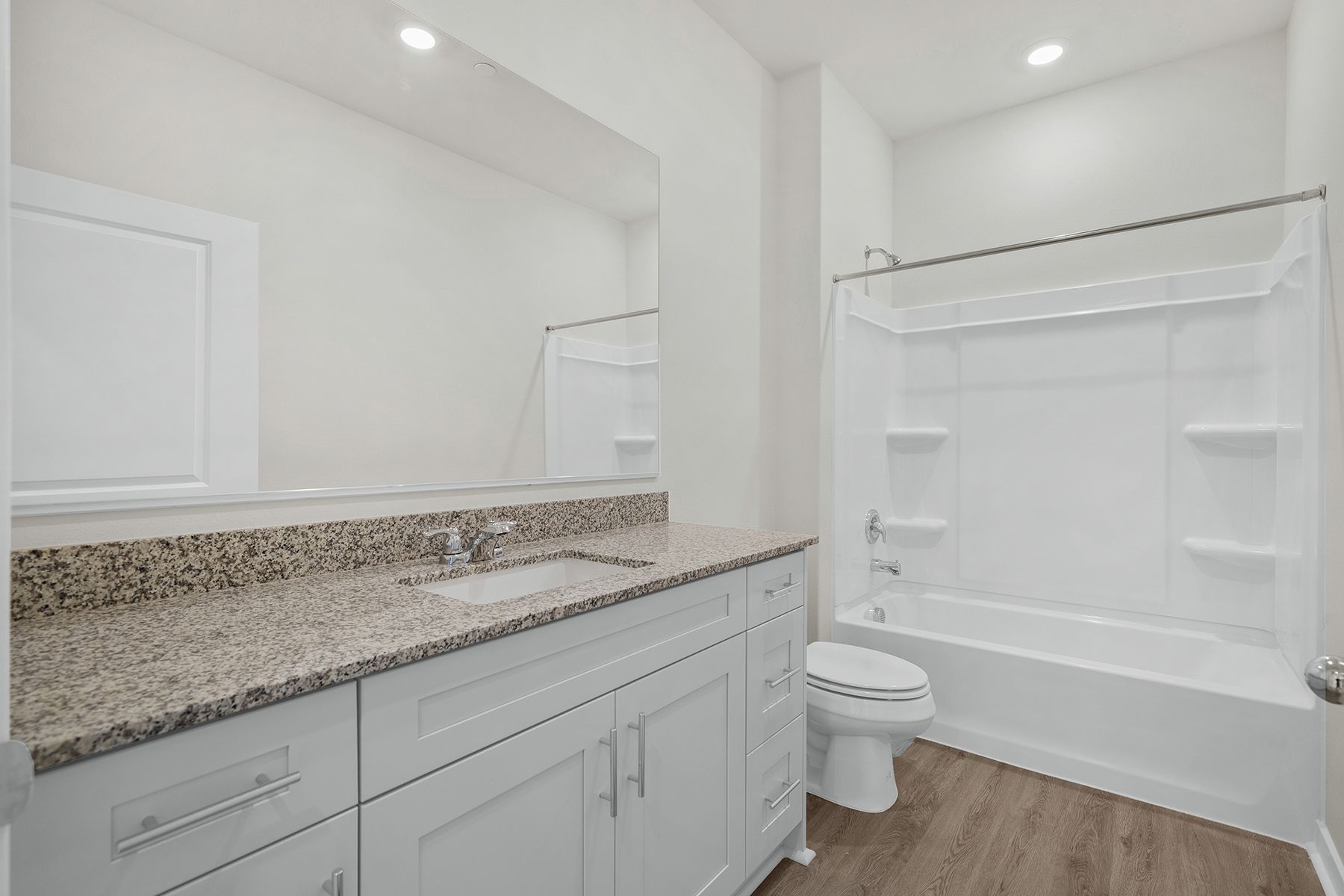 The secondary bathroom has the tub/shower combo.