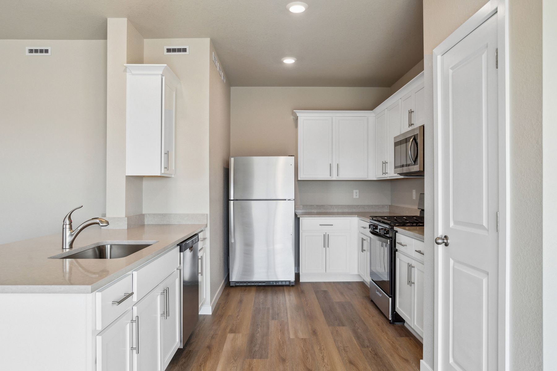 The kitchen appliances come included in this home.