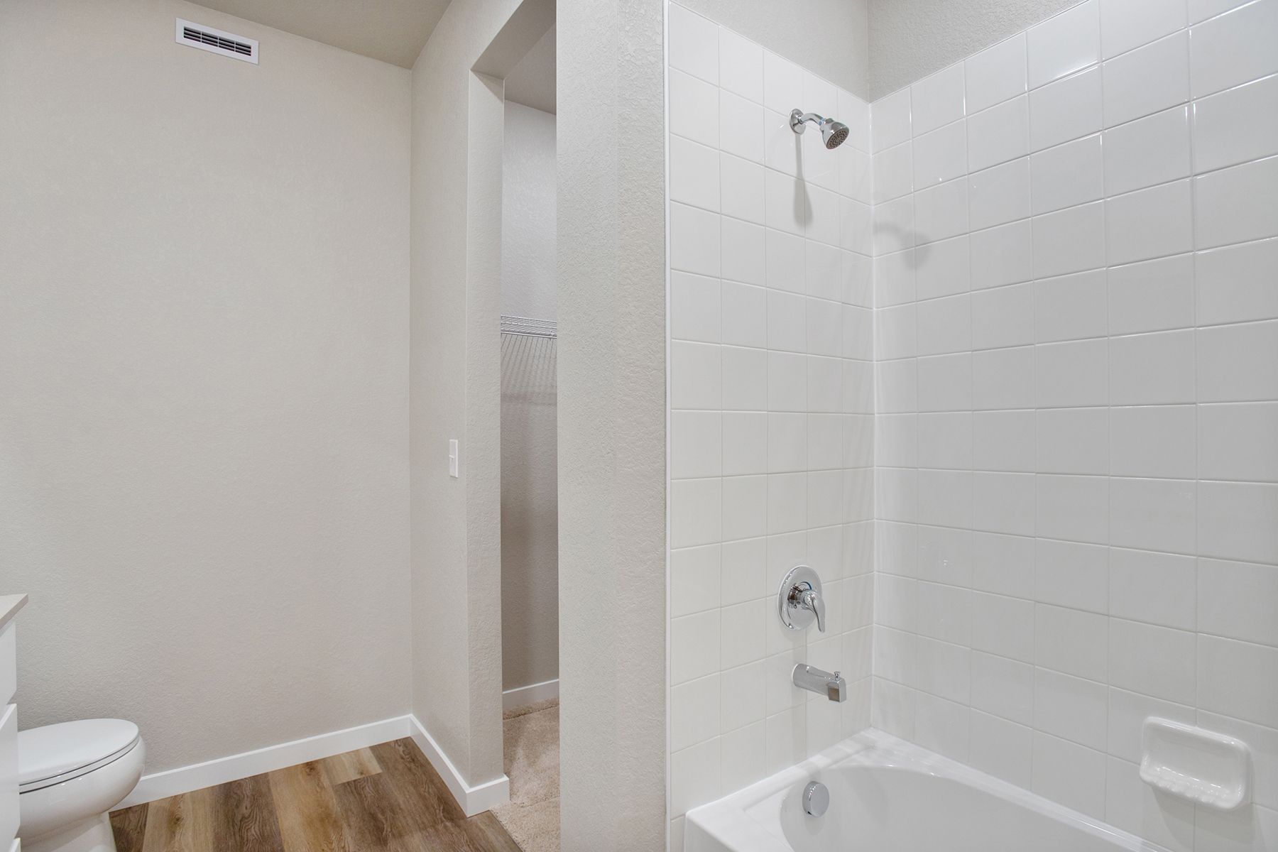 The master bathroom has a tub/shower combo.