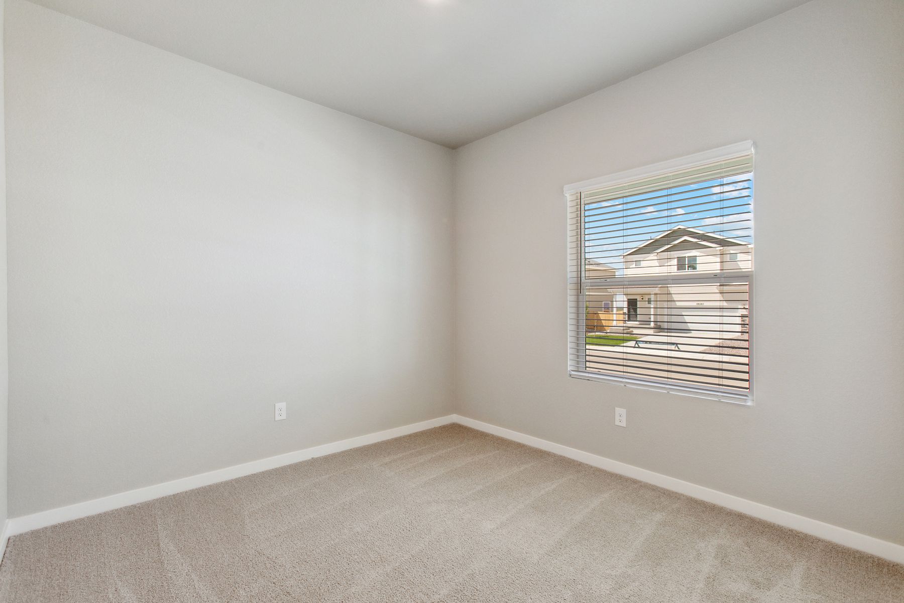 The secondary bedrooms have carpet.