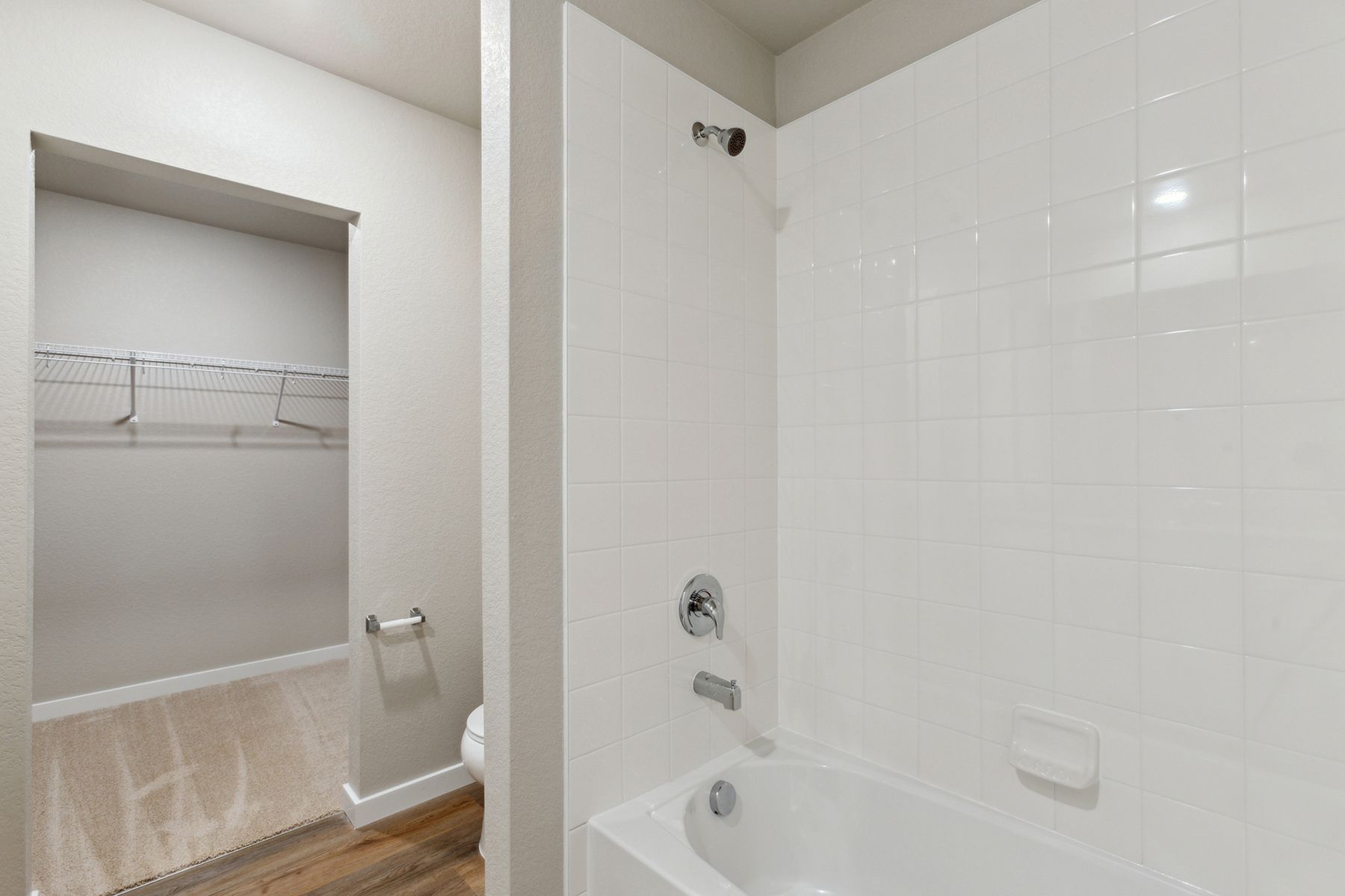 The master bathroom has a tub/shower combo.