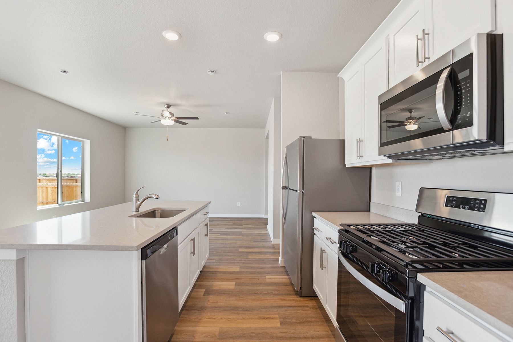 The kitchen appliances come included in this home.