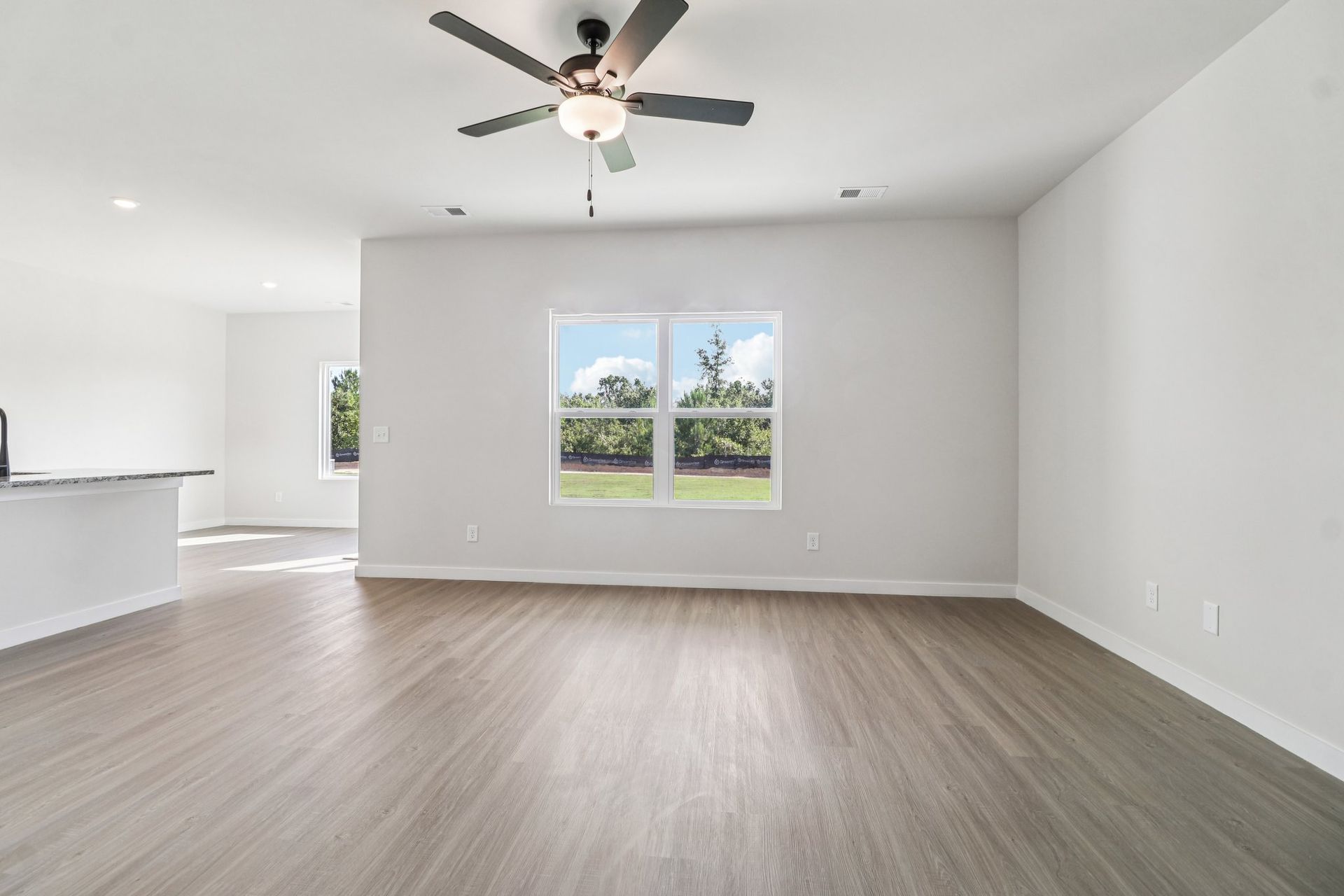 Windows let in lots of light to the main living area. 