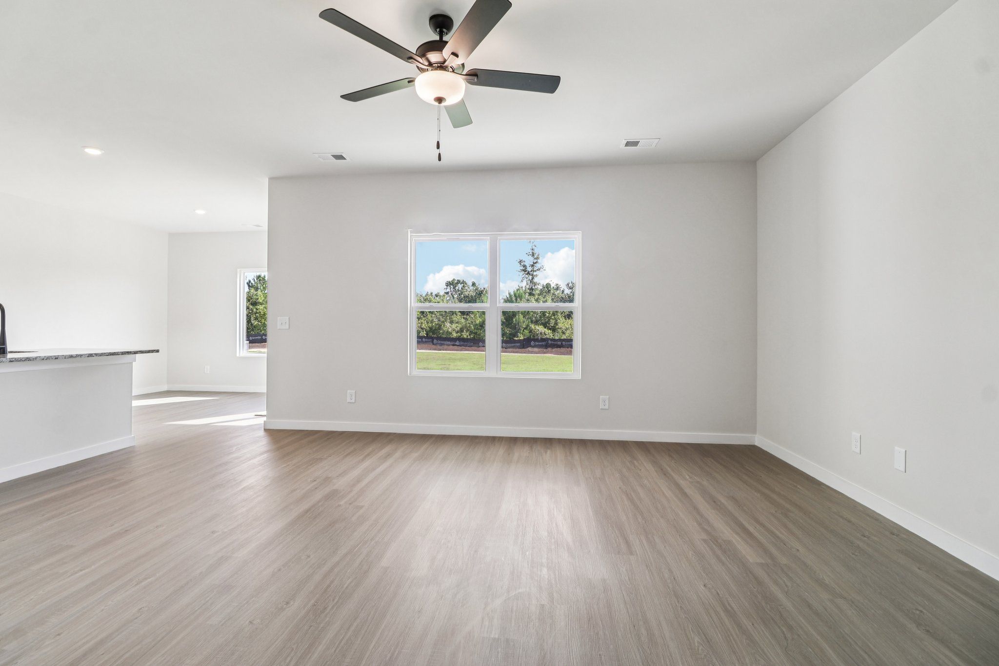 Windows let in lots of light to the main living area.