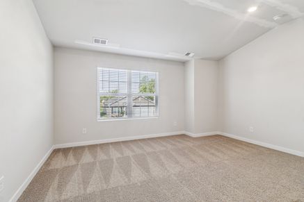 Each bedroom has carpet.