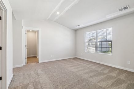 The master bedroom has ample space for your king-sized furniture.