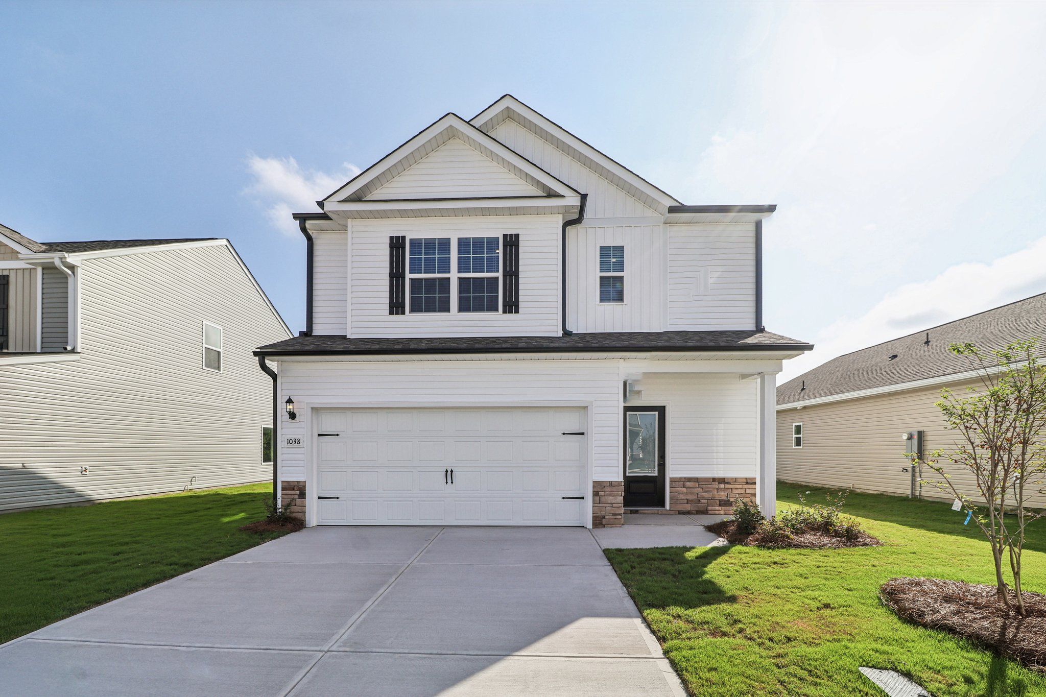 The Carolina has a 2-car garage
