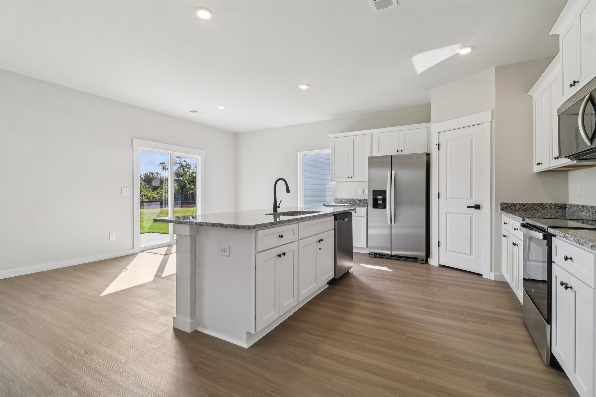 Vinyl flooring throughout.