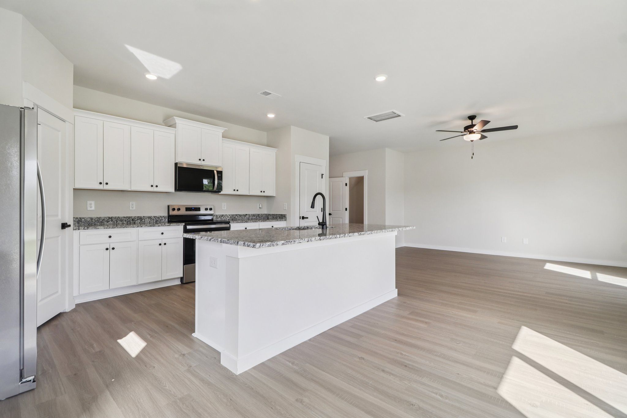The kitchen has granite countertops