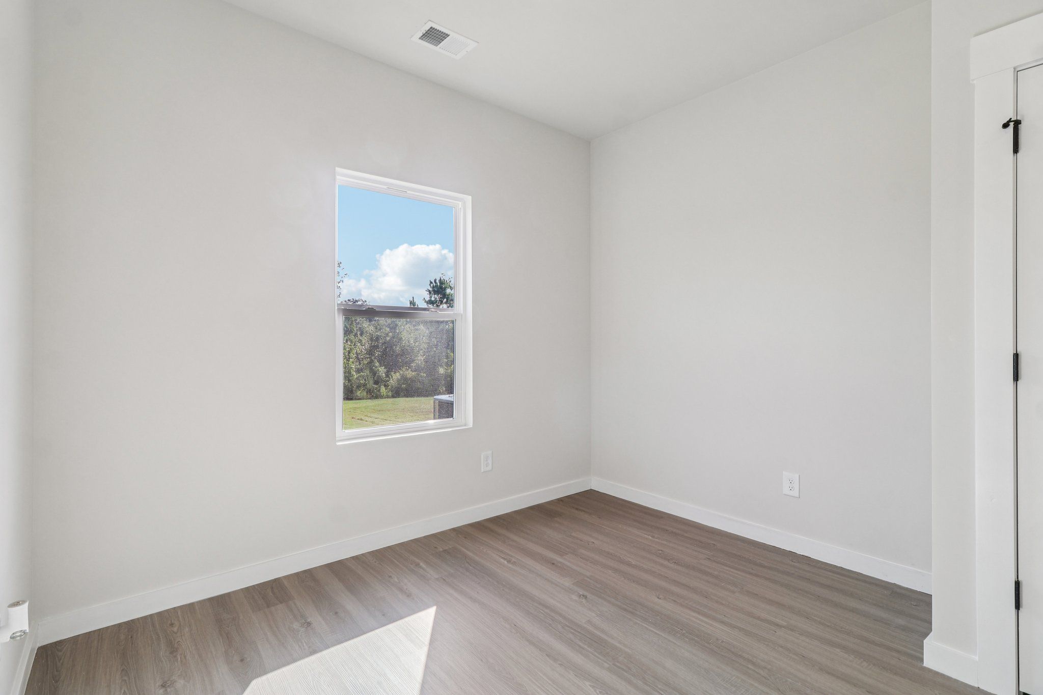 The dining room has a sliding glass door to the back yard