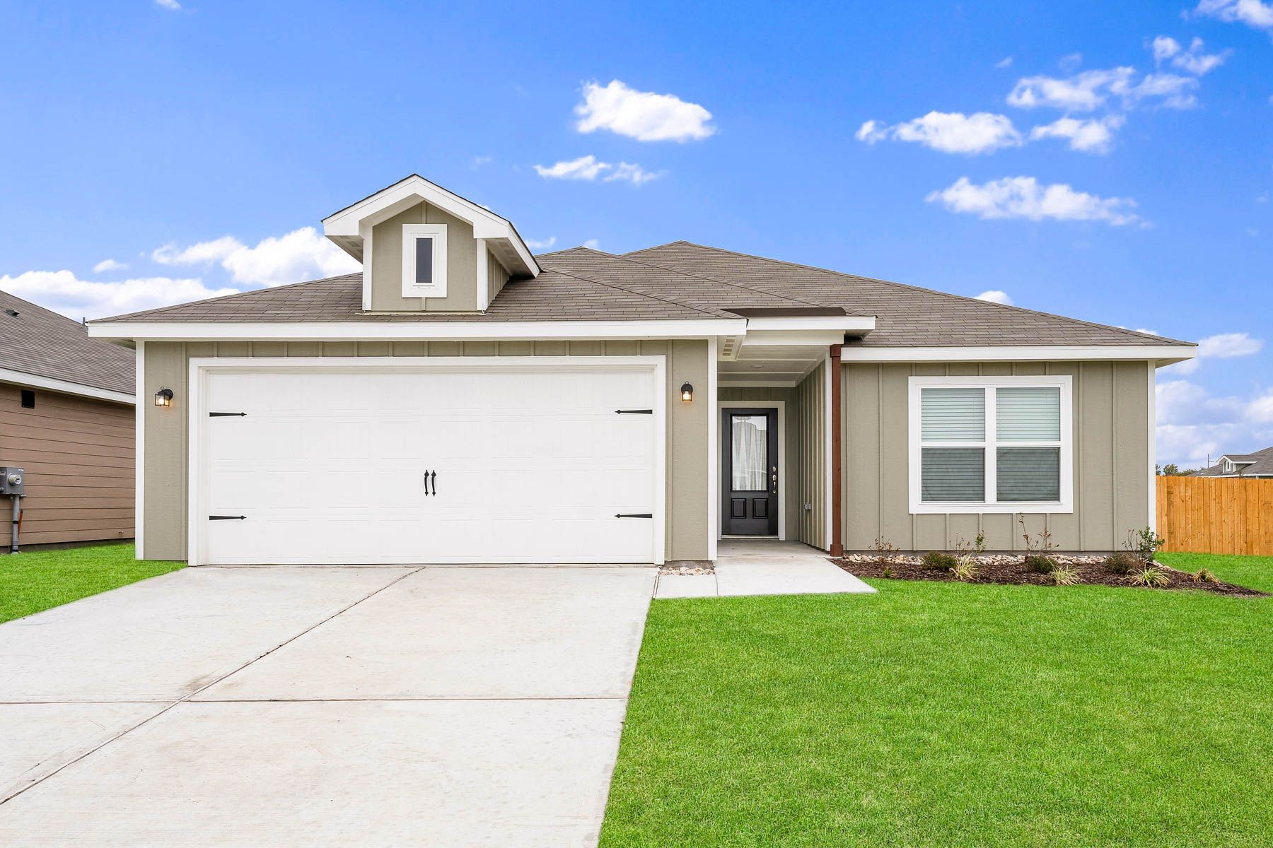 The Rio Grande is a beautiful one-story siding home with wood detail.