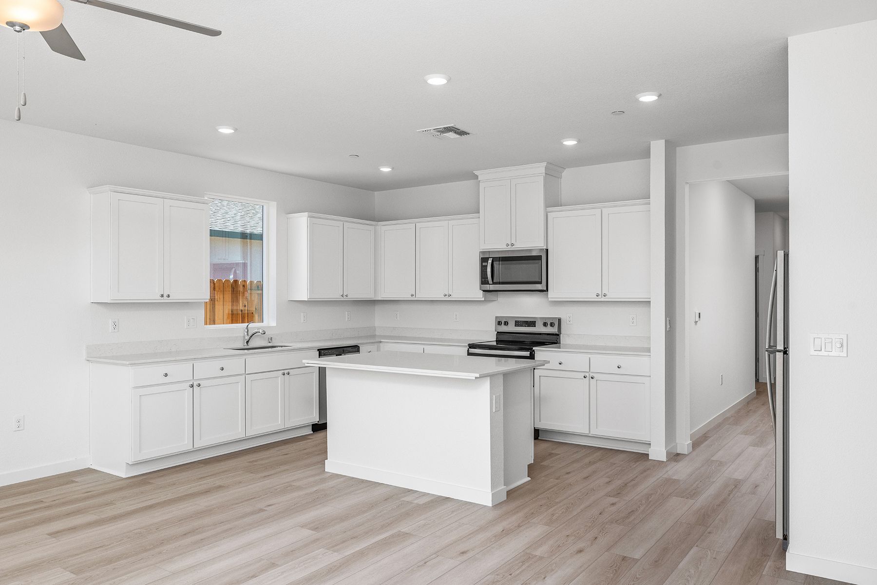 The kitchen appliances come included in this home.