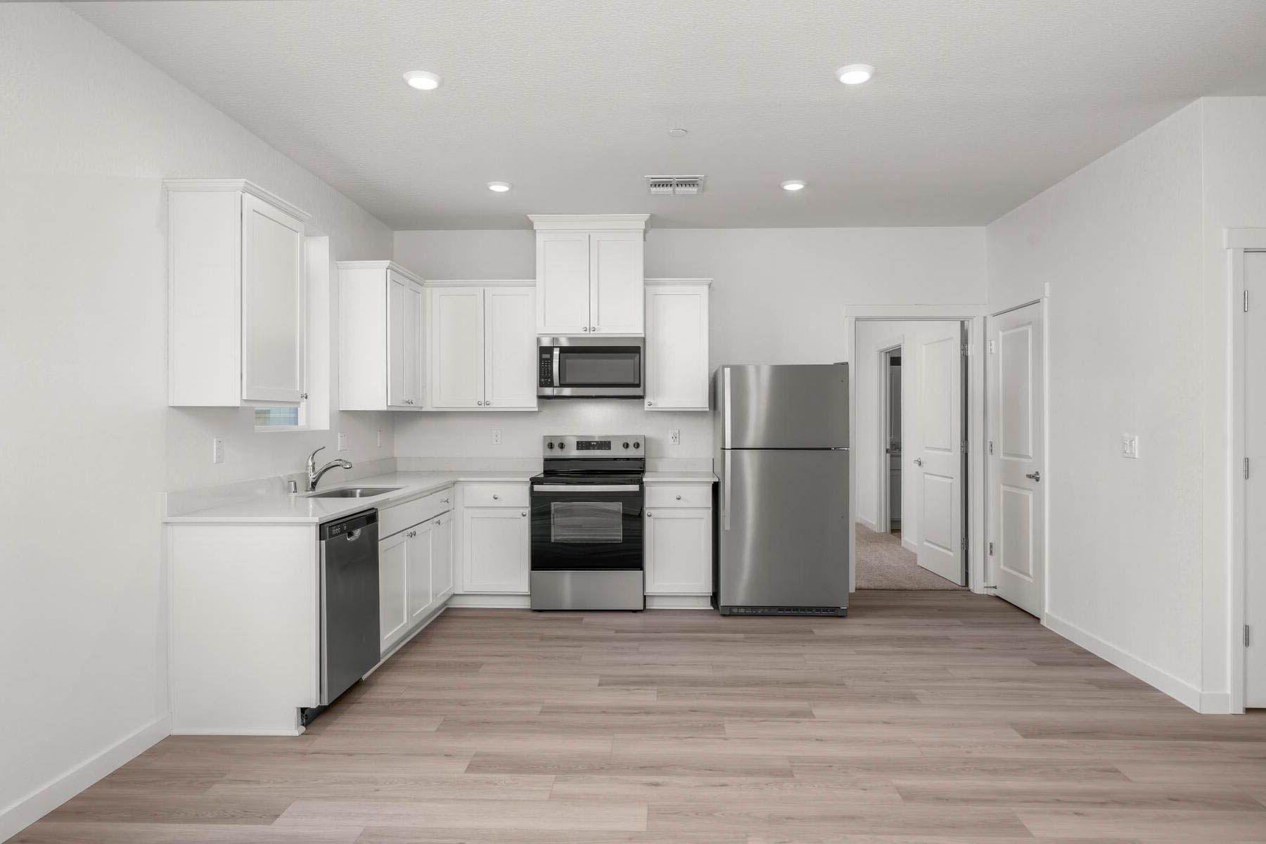 The kitchen appliances come included in this home.