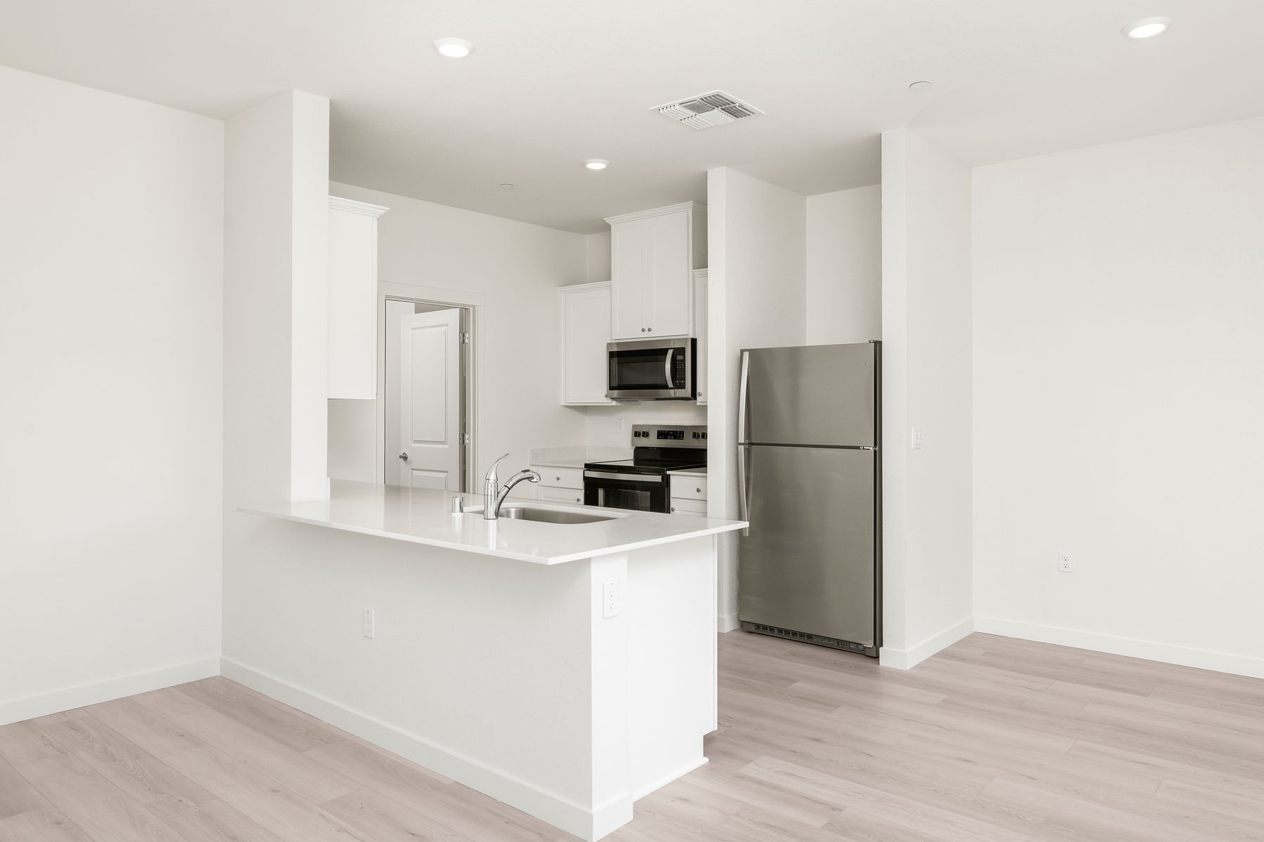 The kitchen appliances come included in this home.