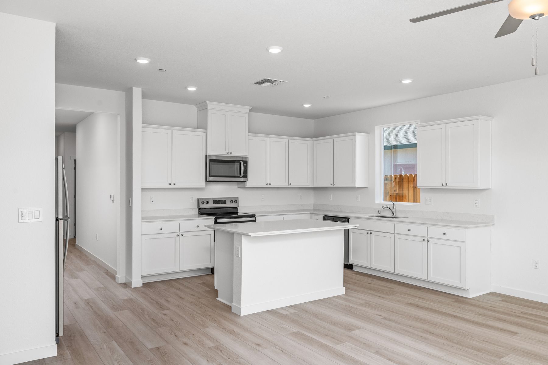 The kitchen appliances come included in this home.
