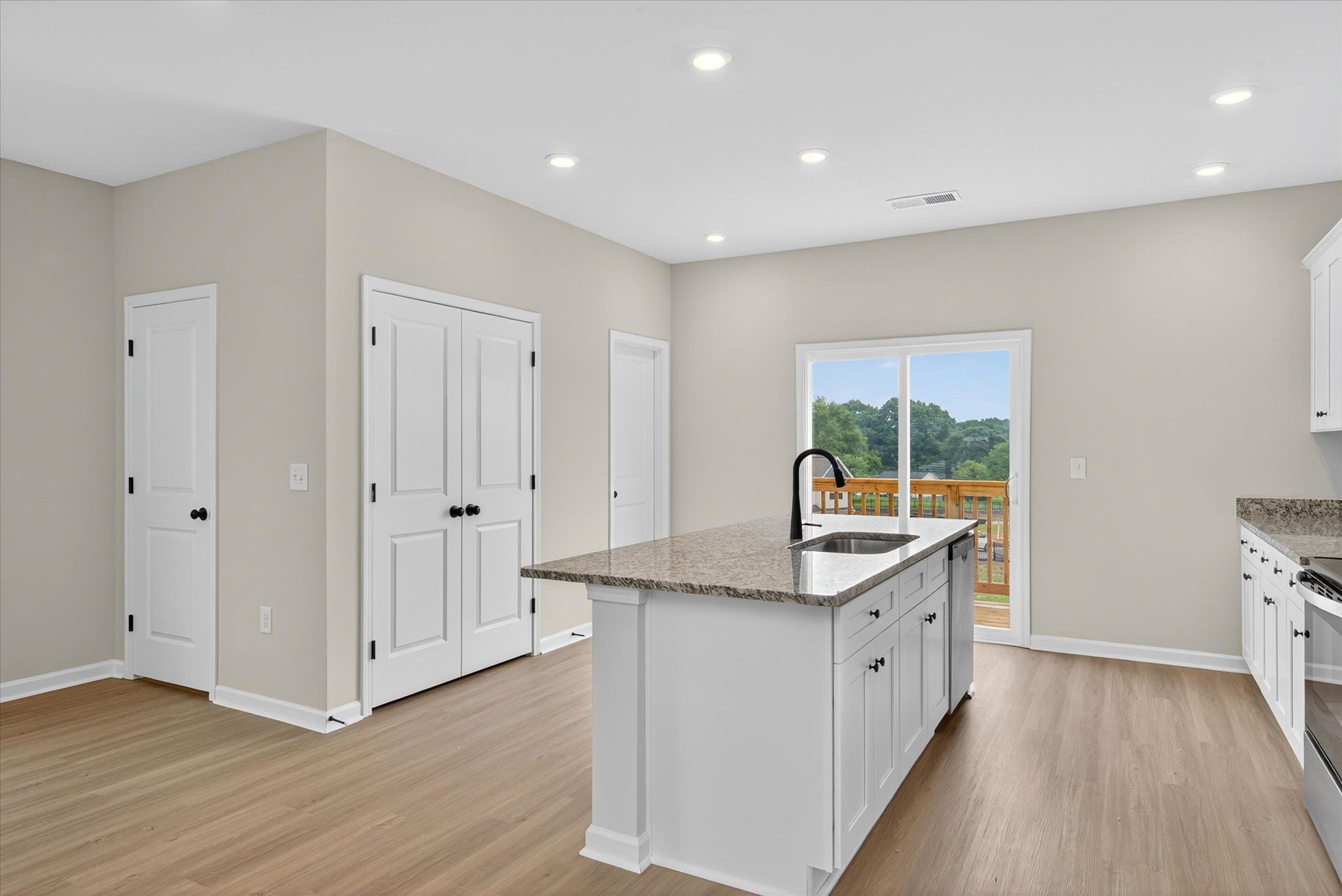 The living room connects to the kitchen. 