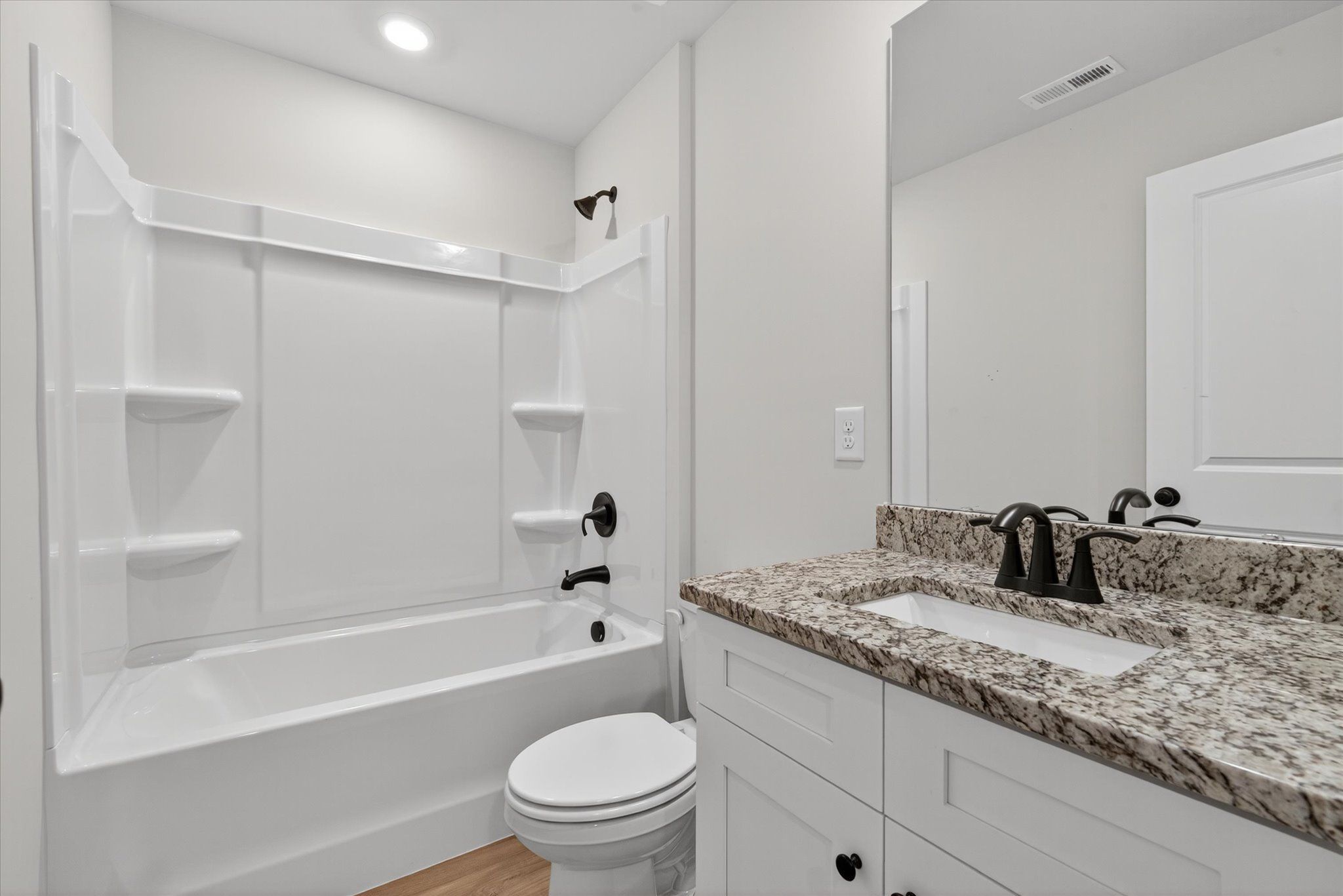 The secondary bathroom.