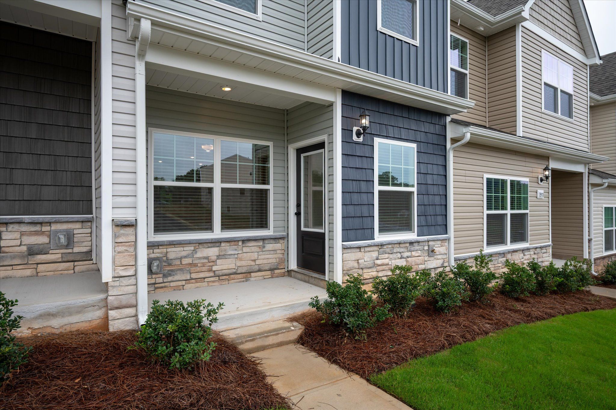 The Alpine has a front porch. 