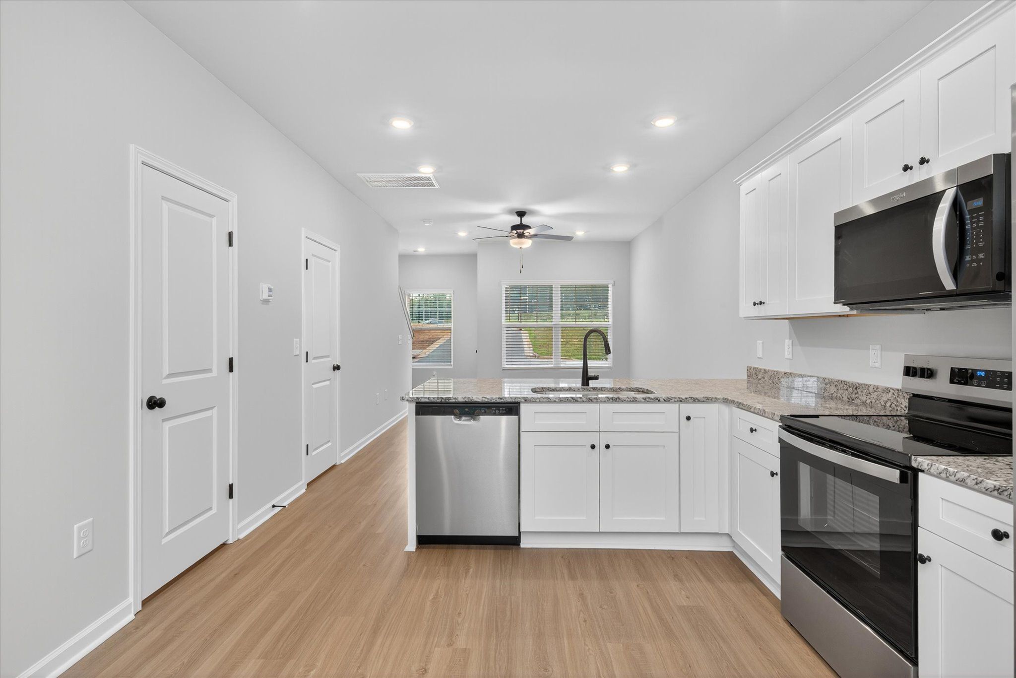 The kitchen has granite countertop