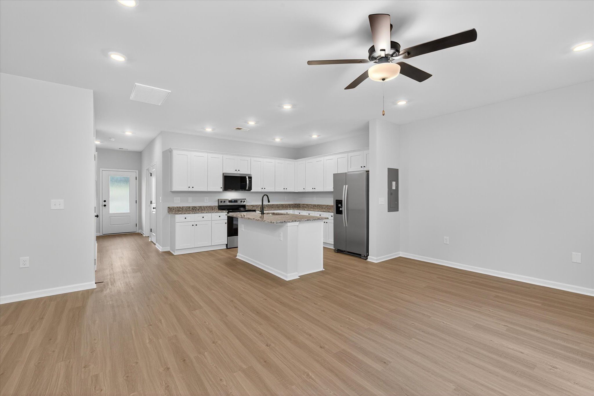 The living room connects to the kitchen. 