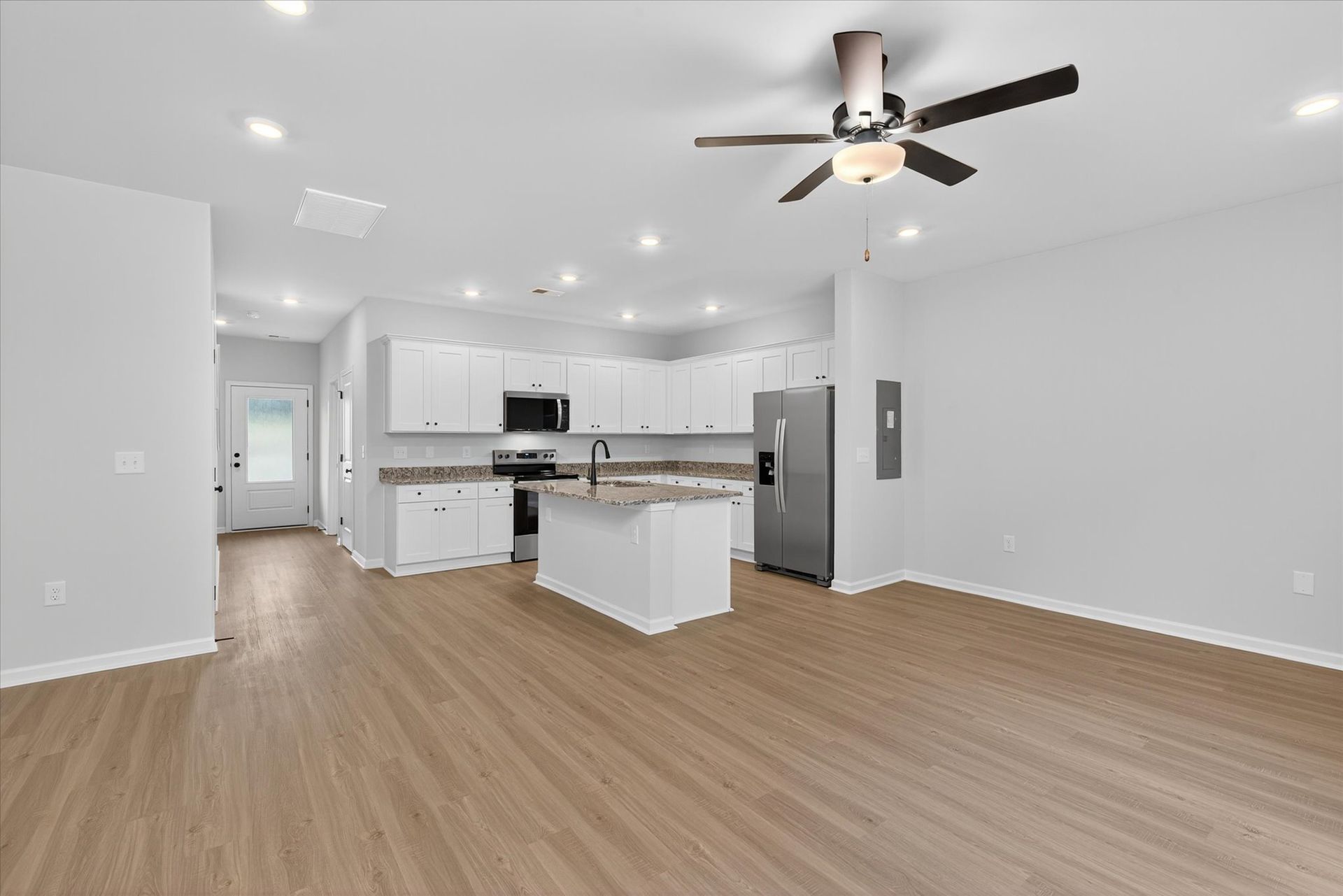 The living room connects to the kitchen. 
