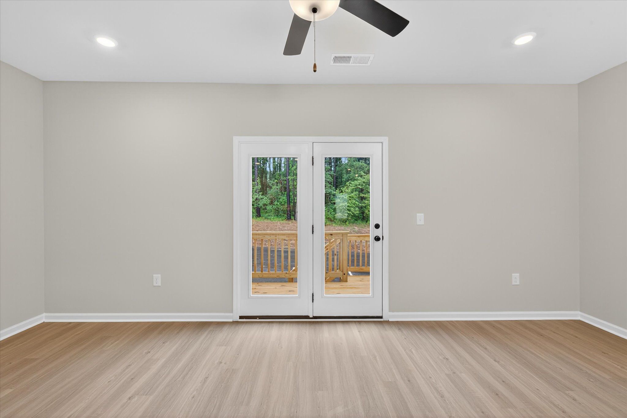The living area opens to the backyard