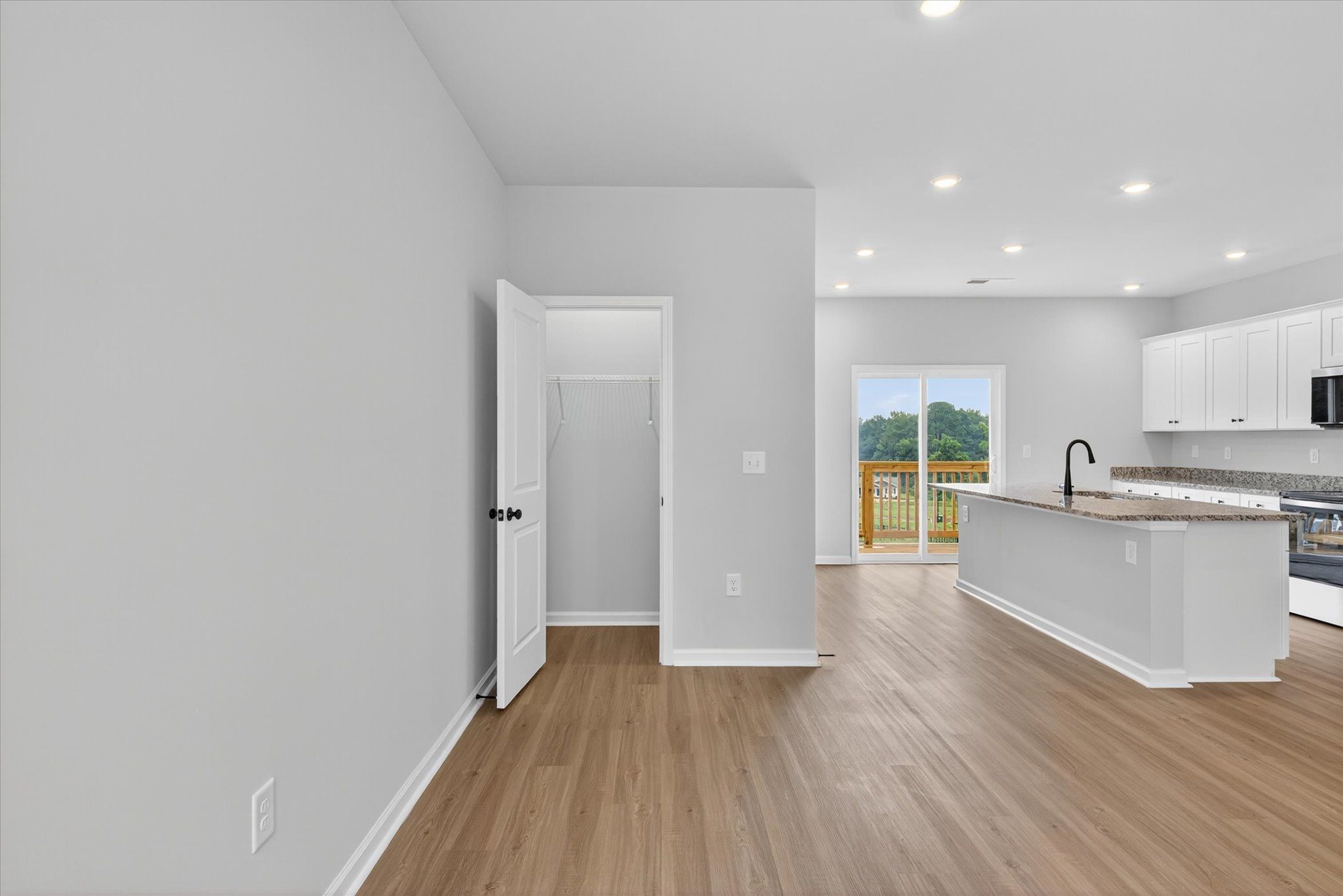Vinyl plank flooring throughout